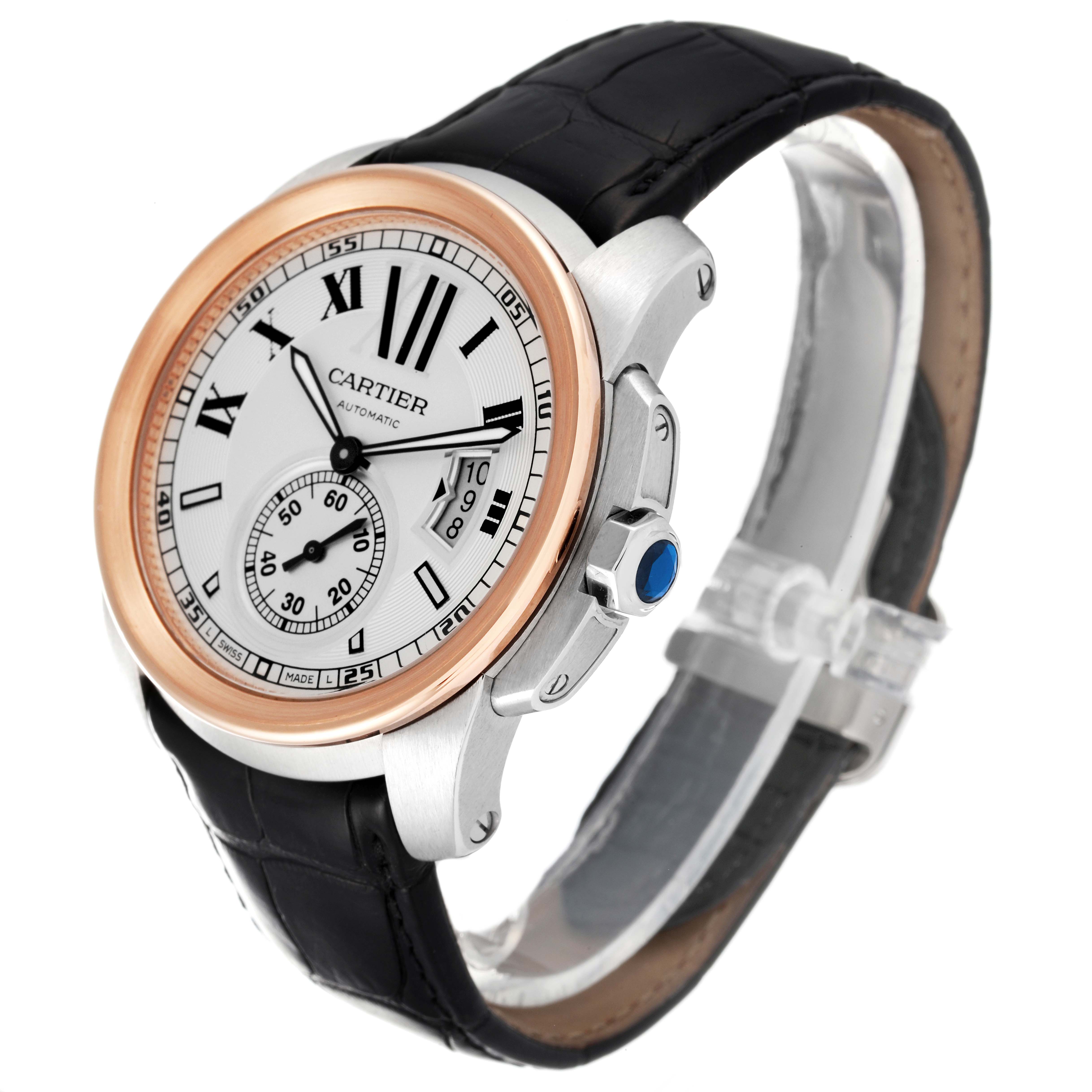This image shows a Calibre de Cartier watch by Cartier at a three-quarter angle, highlighting the face, bezel, and black leather strap.