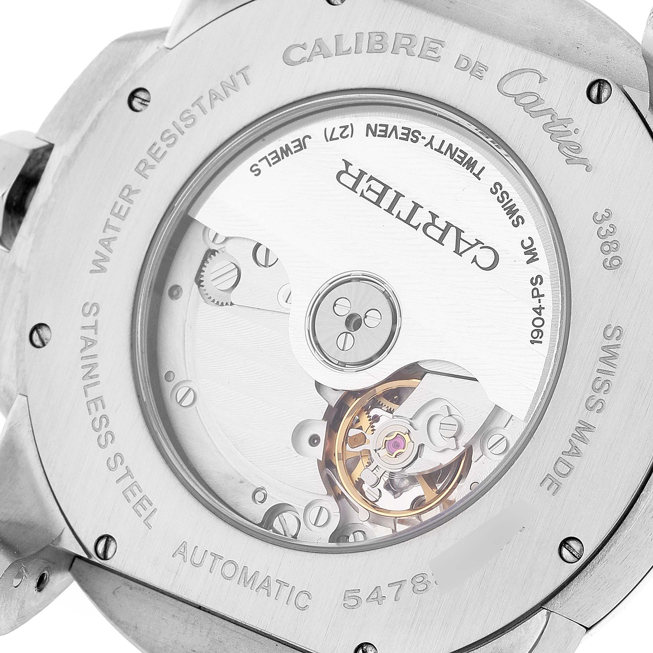 This image shows the back view of the Calibre de Cartier watch, highlighting its automatic movement and internal mechanisms.