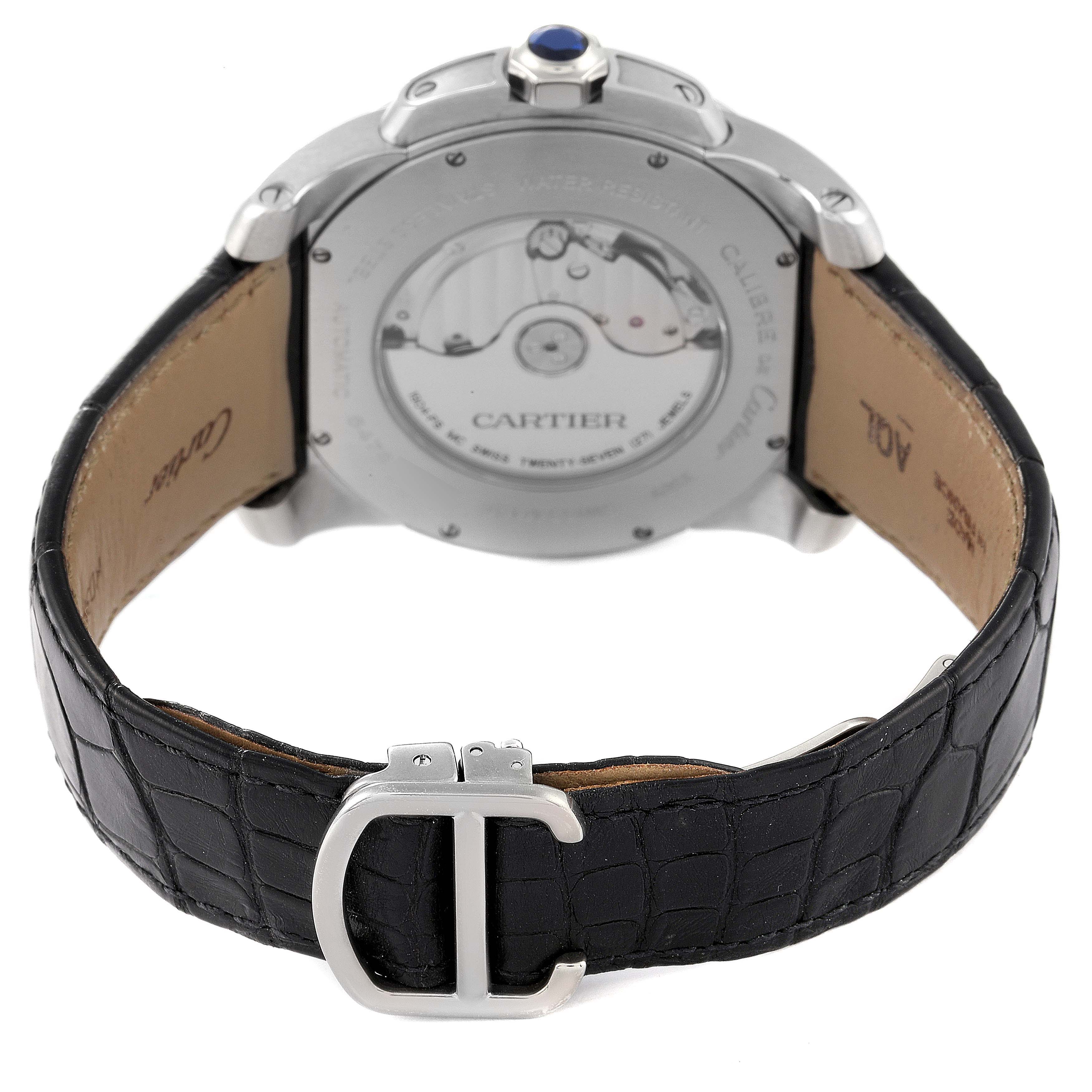 The image shows the back view of the Calibre de Cartier watch by Cartier, highlighting the leather strap and the clasp.