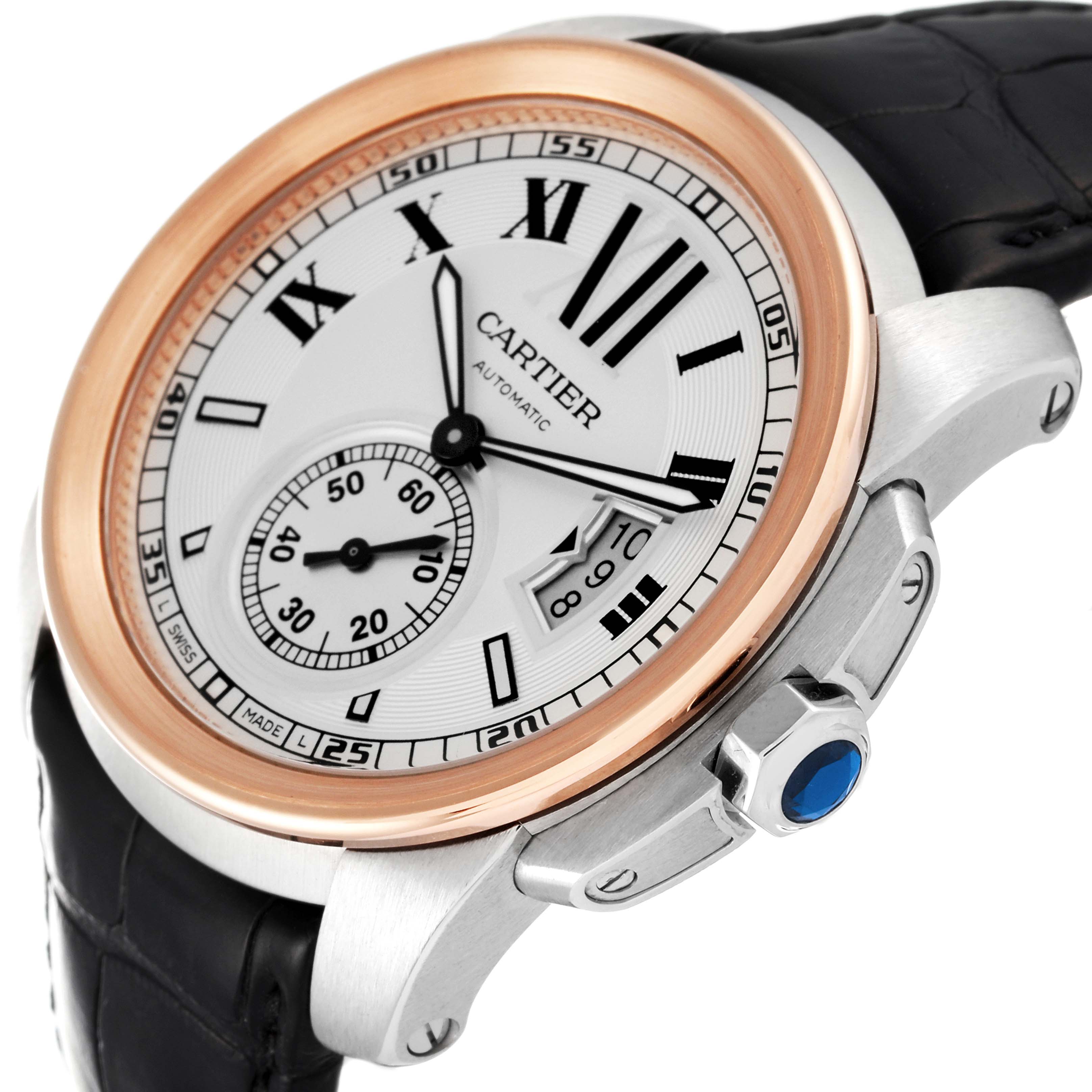 The image shows a close-up angle of the Calibre de Cartier watch, highlighting the dial, crown, and part of the strap.