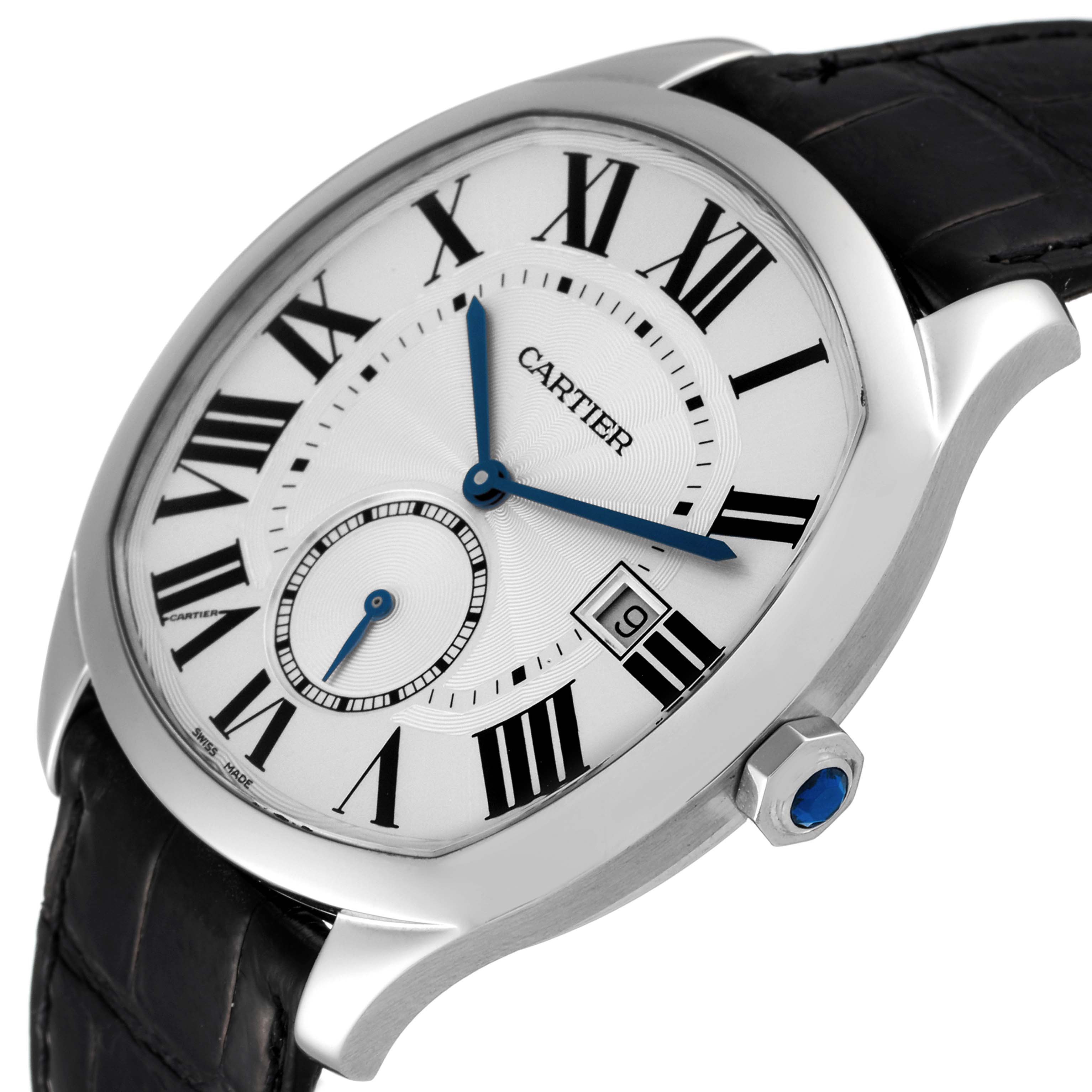 The image shows a Drive de Cartier watch by Cartier at an angled view, highlighting its face, Roman numerals, date window, and crown.