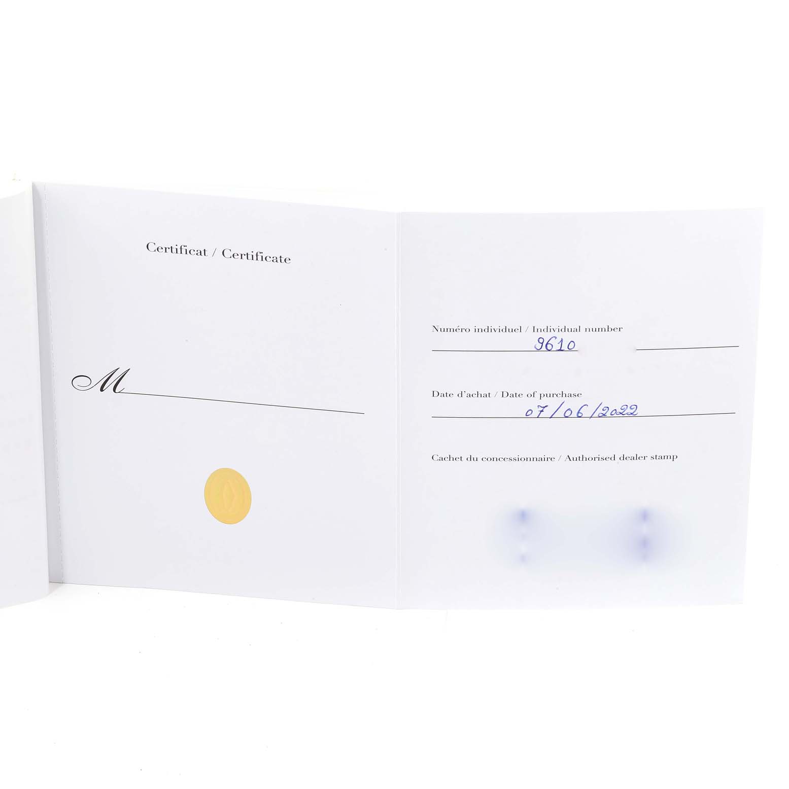 This image shows a warranty certificate for a Cartier Roadster W62042Y5 Men's Rose Gold Brown Dial W62042Y5 Men's Rose Gold Brown Dial watch, displaying purchase details and an individual number.