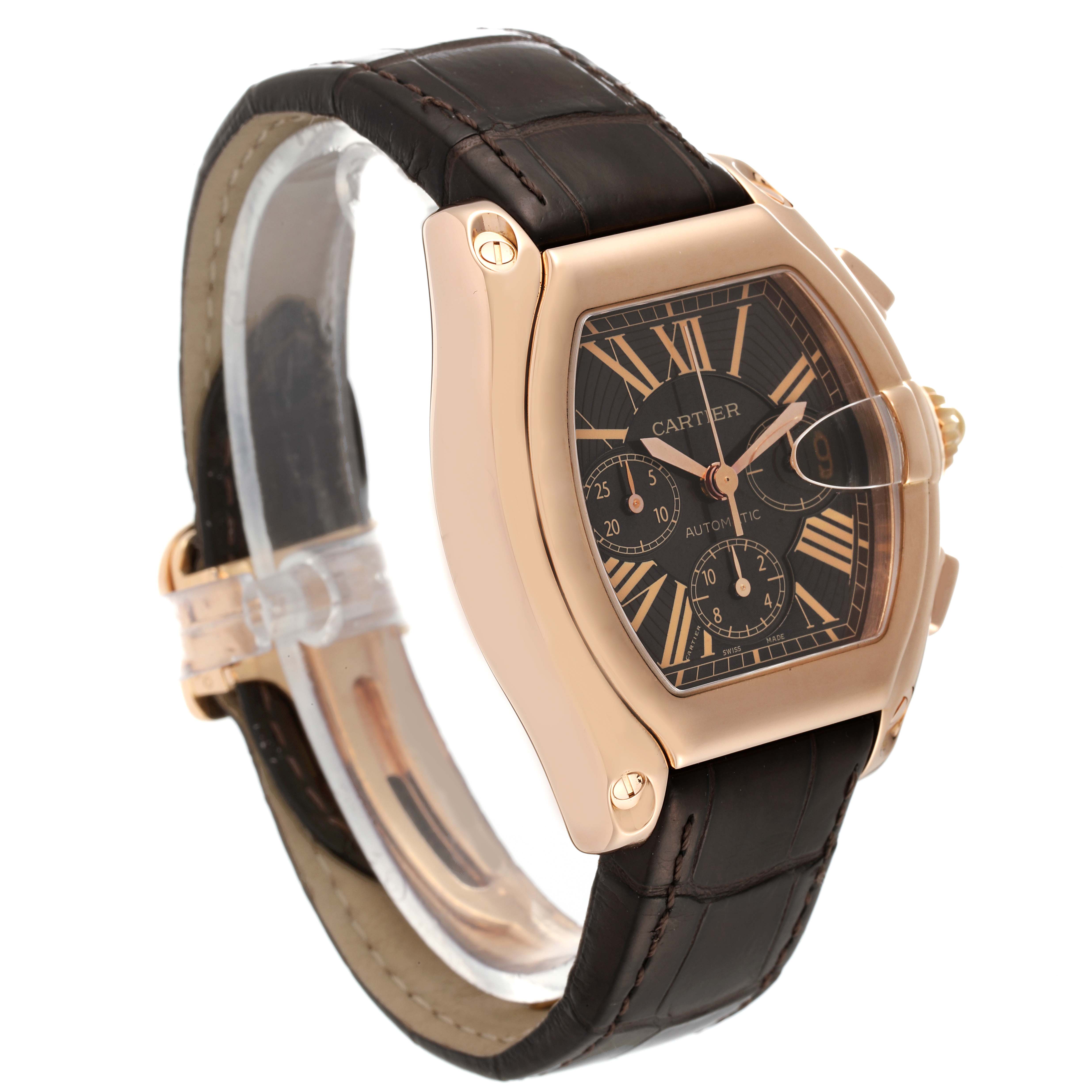 The image shows a Cartier Roadster W62042Y5 Men's Rose Gold Brown Dial W62042Y5 Men's Rose Gold Brown Dial watch at a slight angle, highlighting its black dial, rose gold casing, and leather strap.