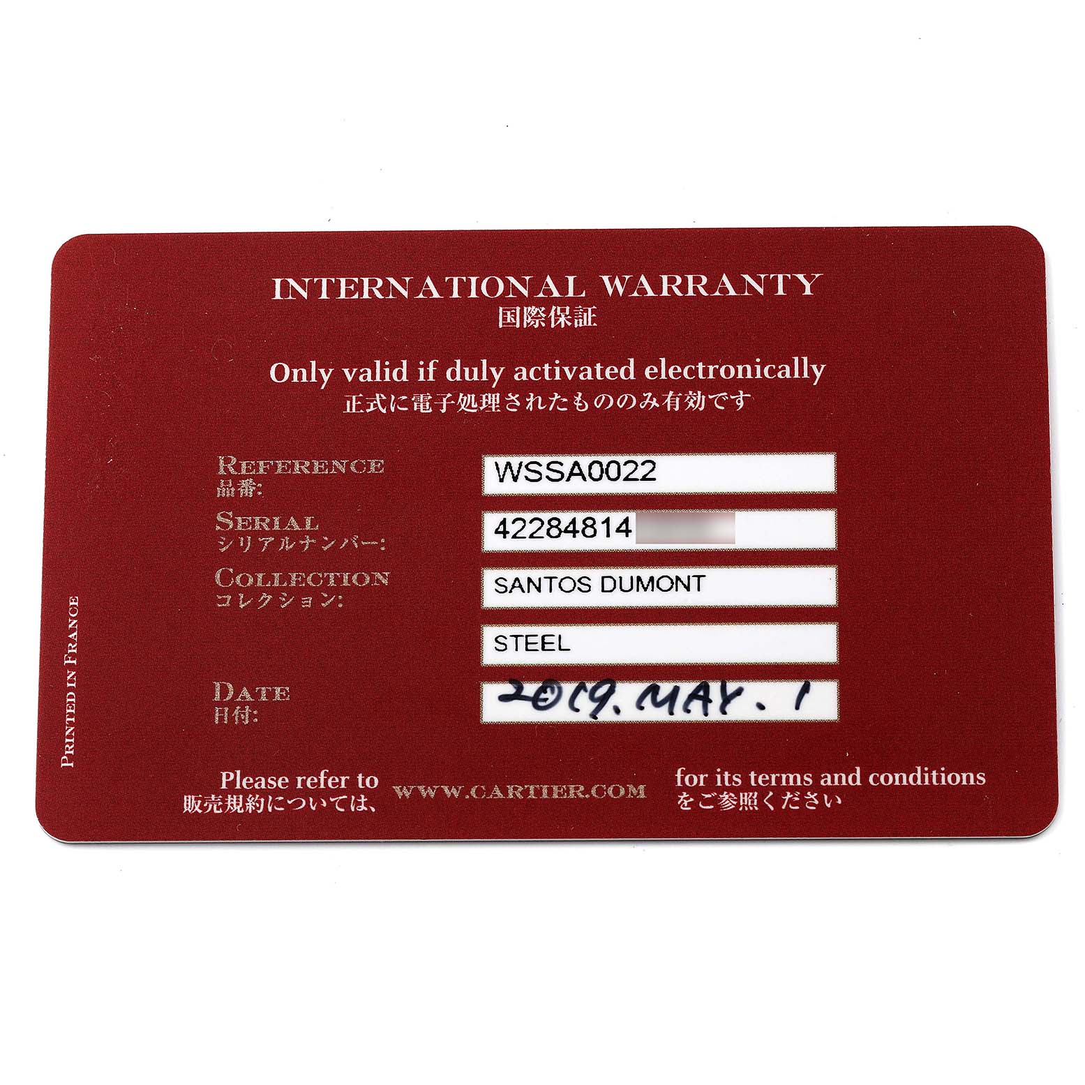 This image shows an international warranty card for a Santos Dumont model by Cartier, displaying reference, serial, collection, and date details.