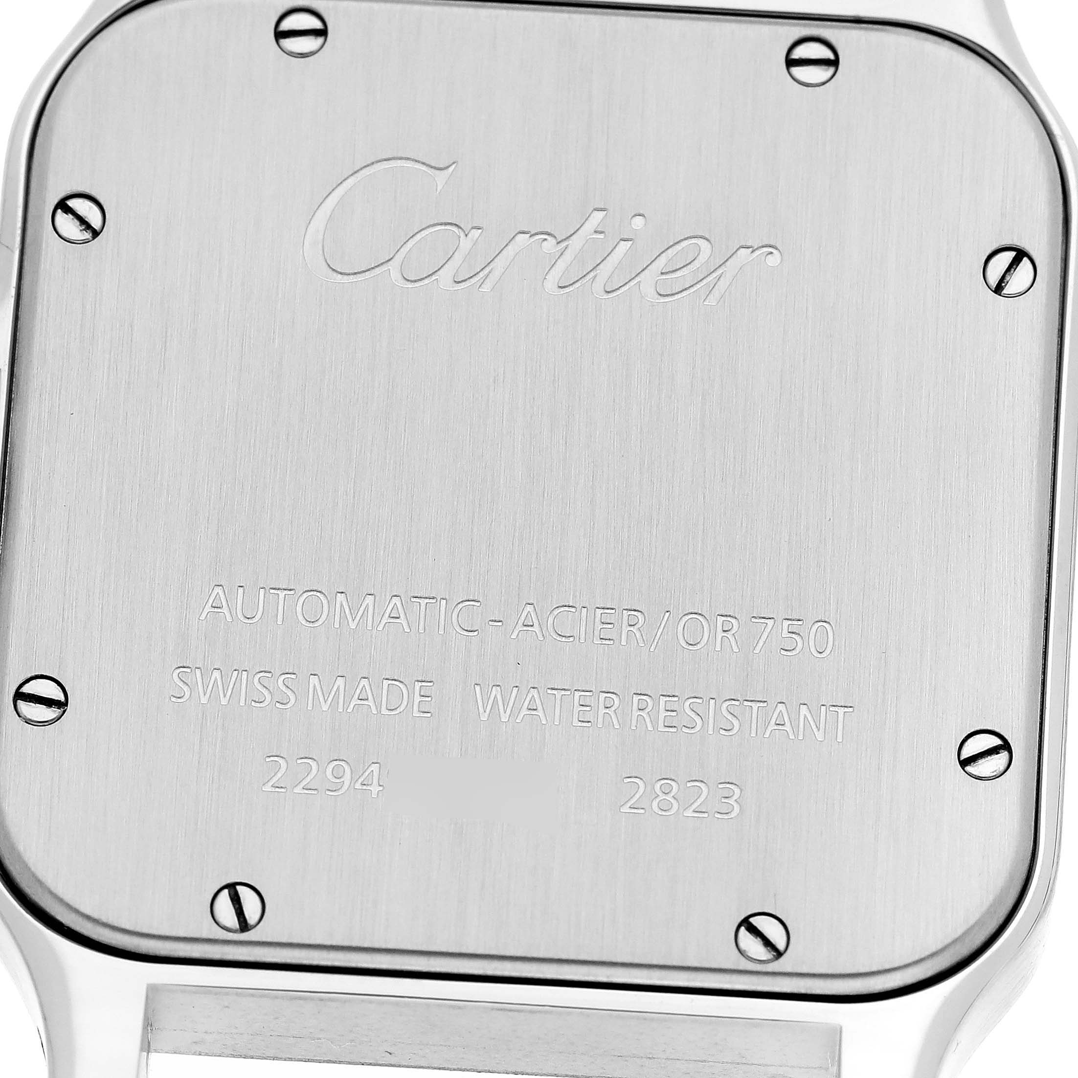 The image shows the back case of a Santos model watch by Cartier, highlighting the engravings and screws.