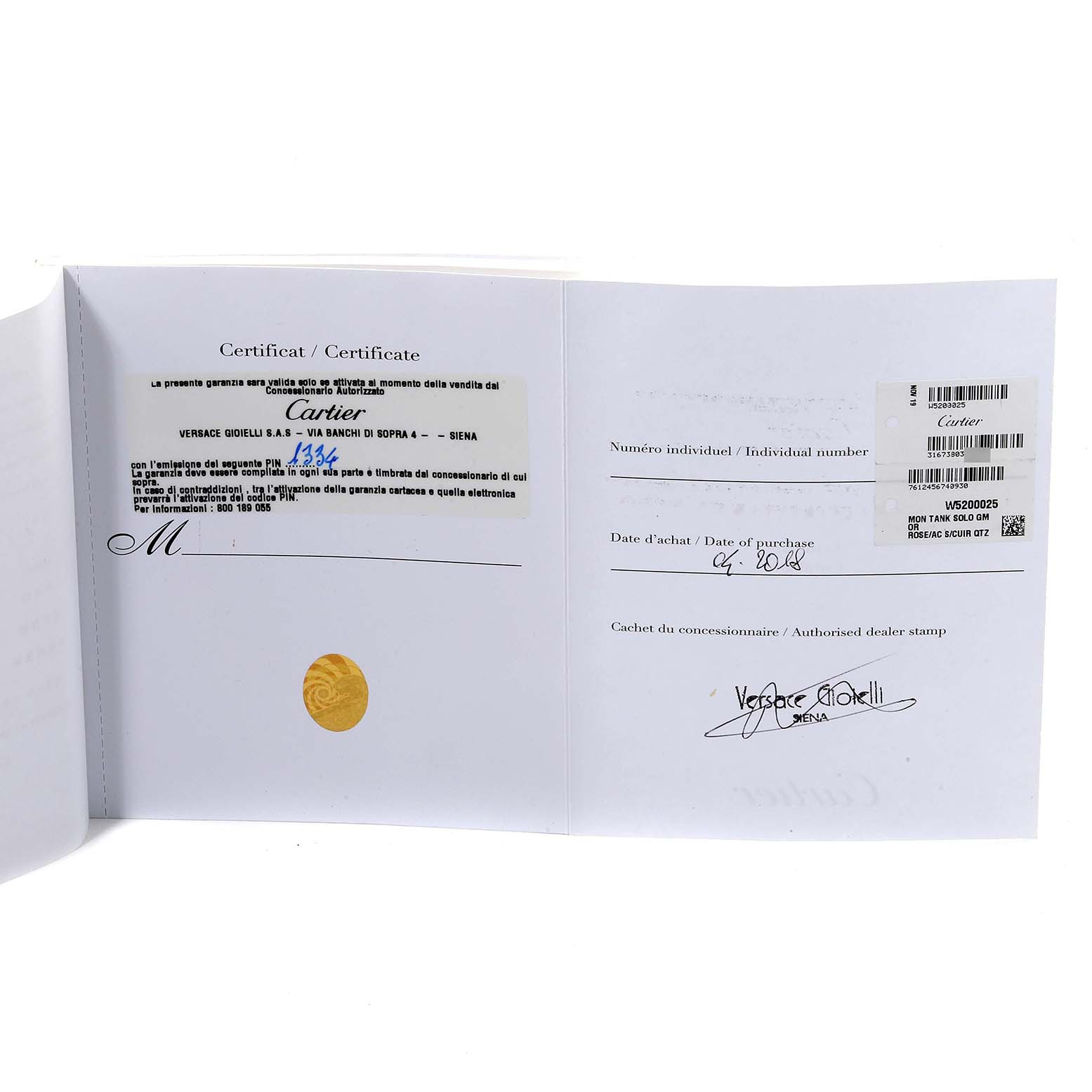 This image shows an open warranty certificate for the Cartier Tank Solo W5200025 Men
s Steel and Gold (two tone) Silver Dial W5200025 Men
s Steel and Gold (two tone) Silver Dial watch model.