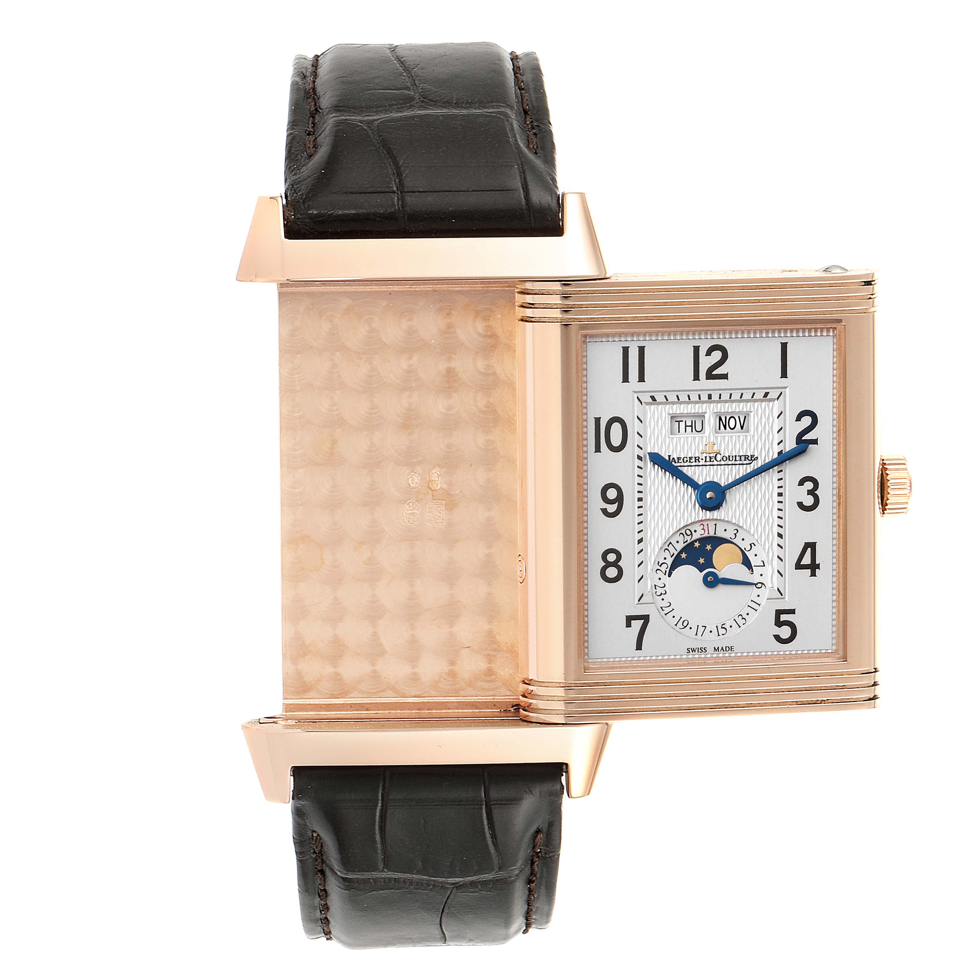 This Jaeger LeCoultre Reverso Q3752520 Men's Rose Gold Silver Dial Q3752520 Men's Rose Gold Silver Dial watch is shown at an angle revealing its rotating case and detailed front face.