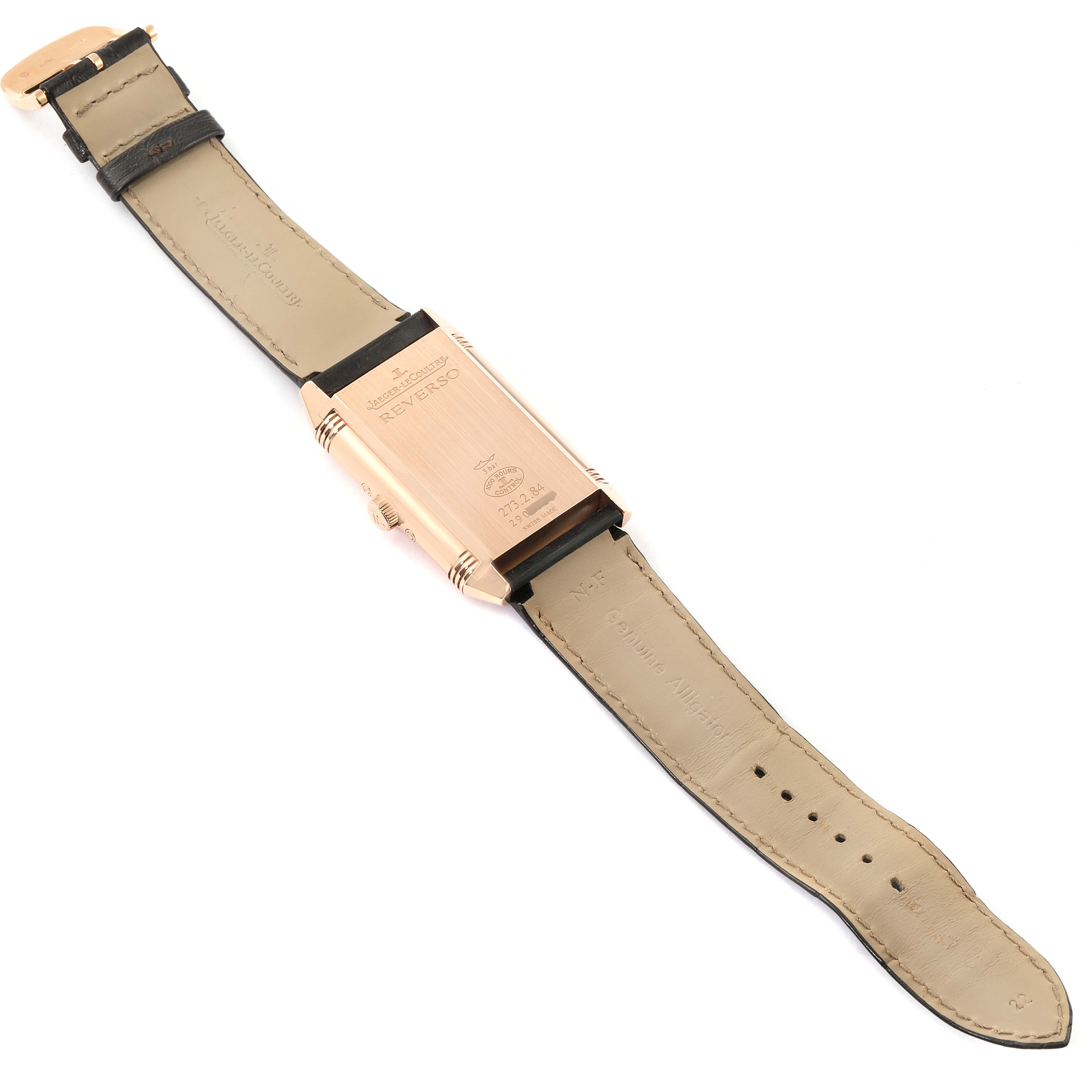 This Jaeger LeCoultre Reverso Q3752520 Men's Rose Gold Silver Dial Q3752520 Men's Rose Gold Silver Dial watch is shown from the back, showcasing the case and both leather straps fully extended.