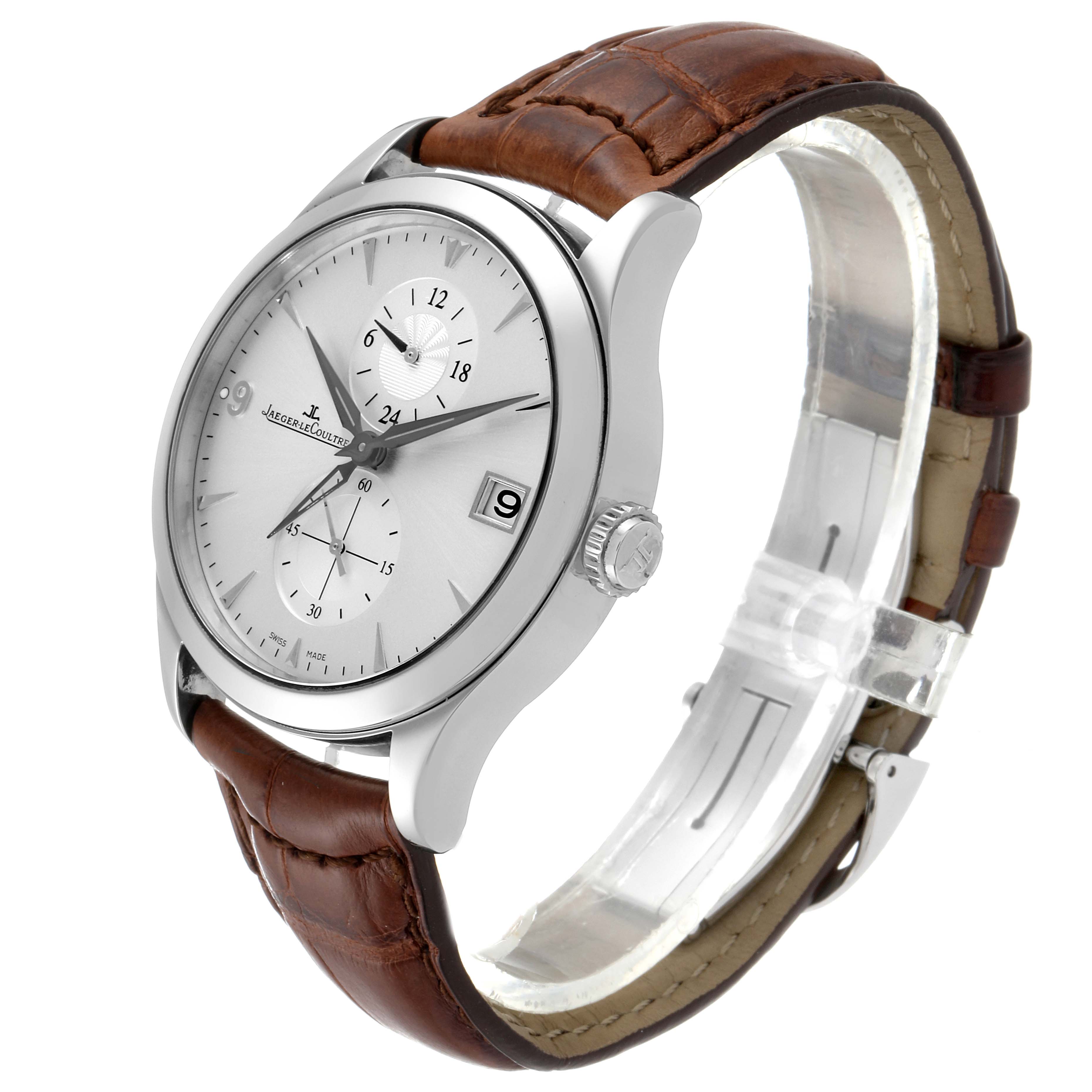 The image shows a Jaeger LeCoultre Master Q1628430 Men
s Stainless Steel Silver Dial Q1628430 Men
s Stainless Steel Silver Dial watch at a three-quarter angle highlighting its dial, case, crown, and brown leather strap.