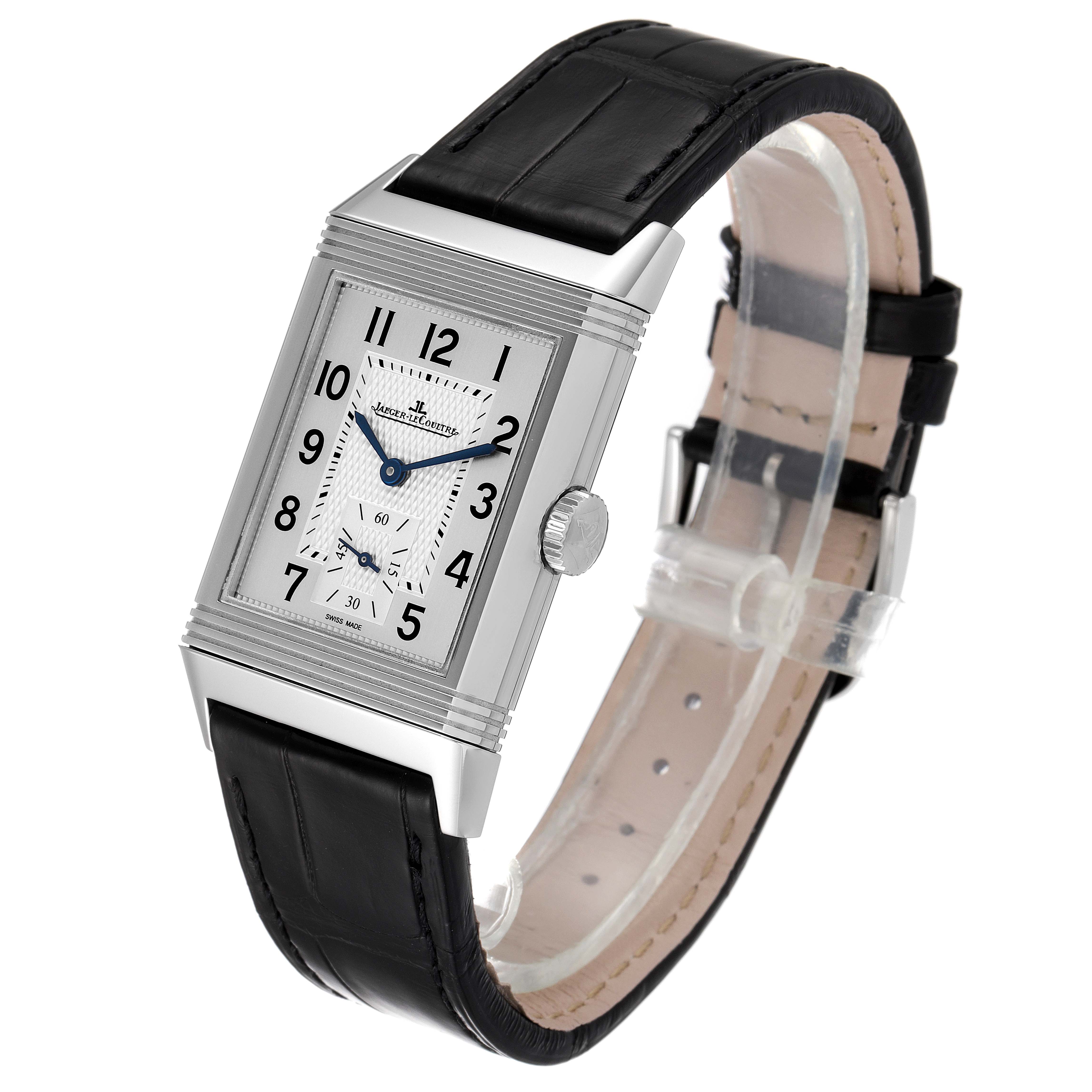 This image shows a Jaeger-LeCoultre Reverso watch at a three-quarter angle, displaying the face, crown, and black leather strap.