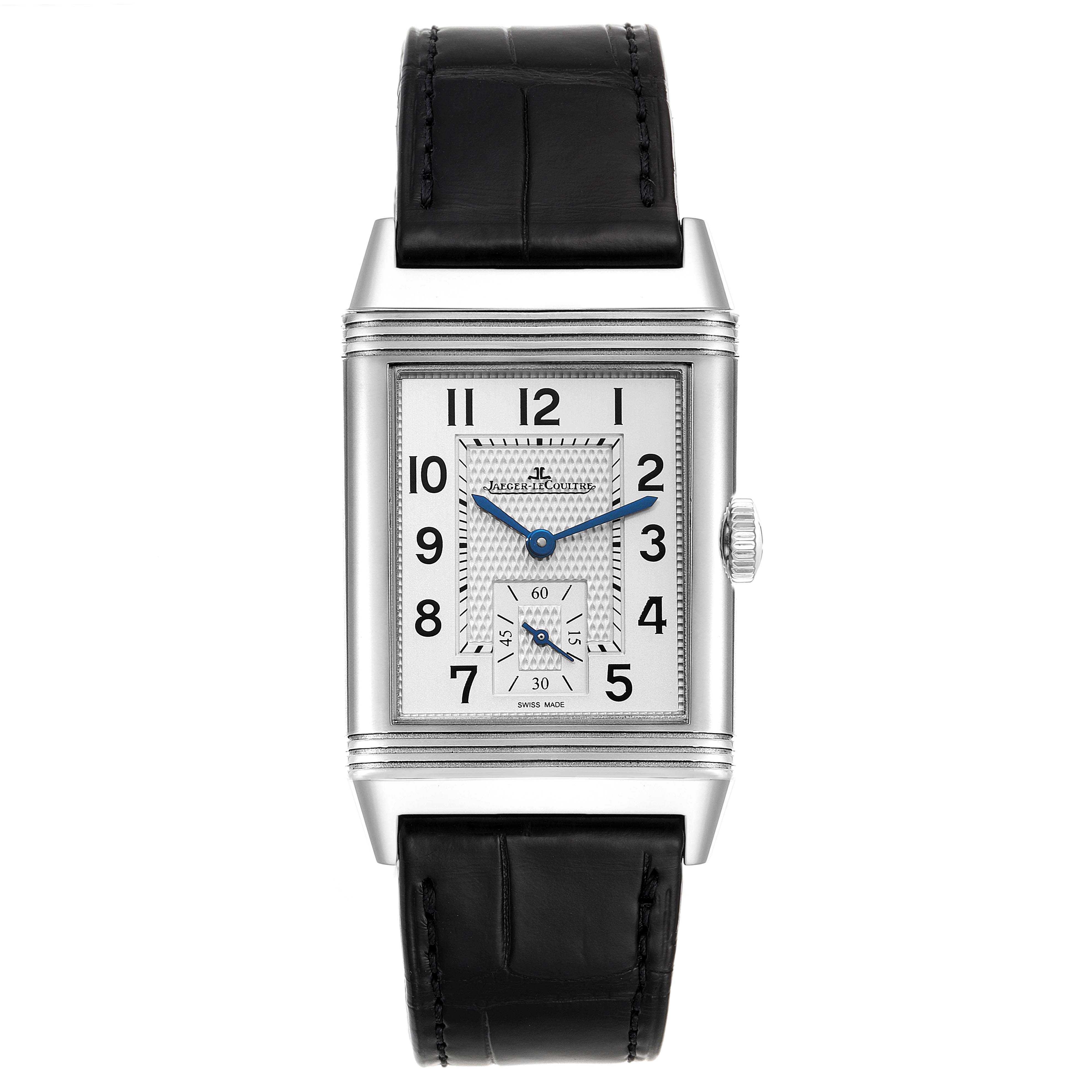 The image shows a front view of the Jaeger LeCoultre Reverso Q3858520 Men's Stainless Steel Silver Dial Q3858520 Men's Stainless Steel Silver Dial watch with a black leather strap and blue hands.