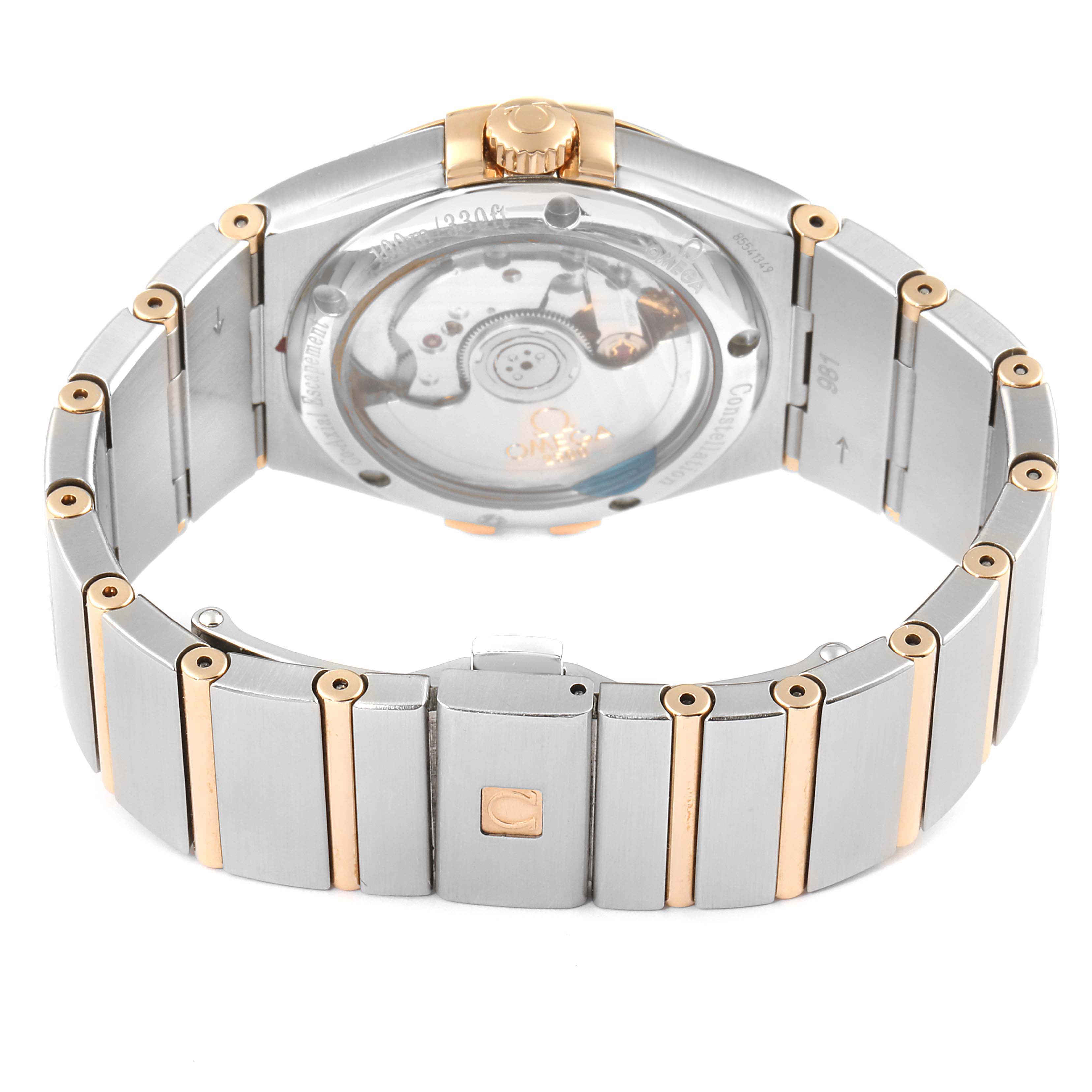 This image shows the back view of an Omega Constellation 123.25.35.20.52.001 Men's Stainless Steel Silver Dial 123.25.35.20.52.001 Men's Stainless Steel Silver Dial watch, highlighting its bracelet and transparent case back.