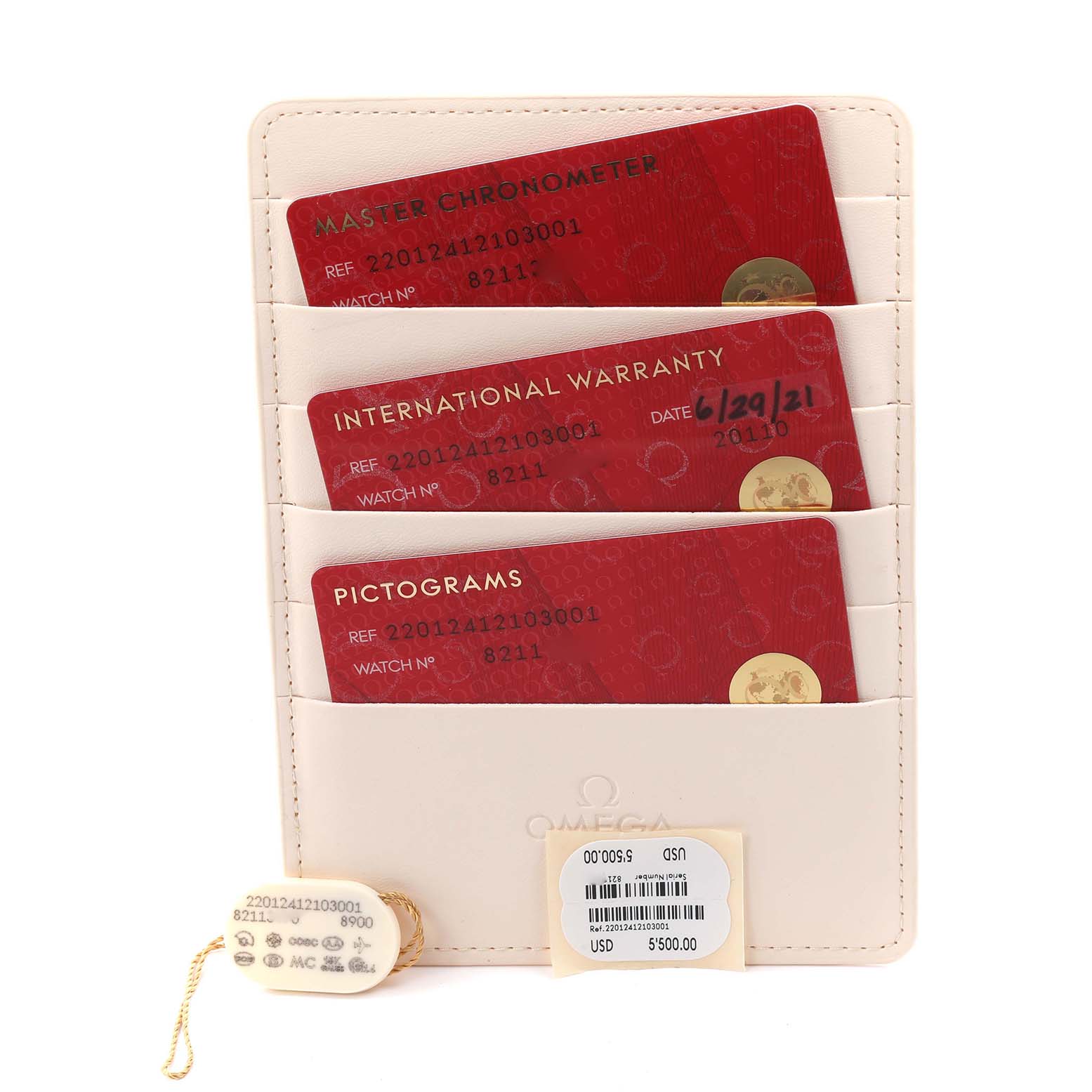 The image shows warranty and pictogram cards along with a tag and label for the Omega Aqua Terra 220.12.41.21.03.001 Men
s Stainless Steel Blue Dial 220.12.41.21.03.001 Men
s Stainless Steel Blue Dial watch model.