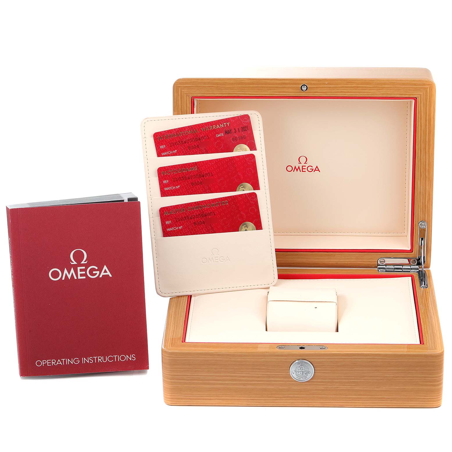 The image shows the Omega Seamaster 210.30.42.20.04.001 Men's Stainless Steel White Dial 210.30.42.20.04.001 Men's Stainless Steel White Dial watch's wooden box, operating instructions, and a holder with red cards.