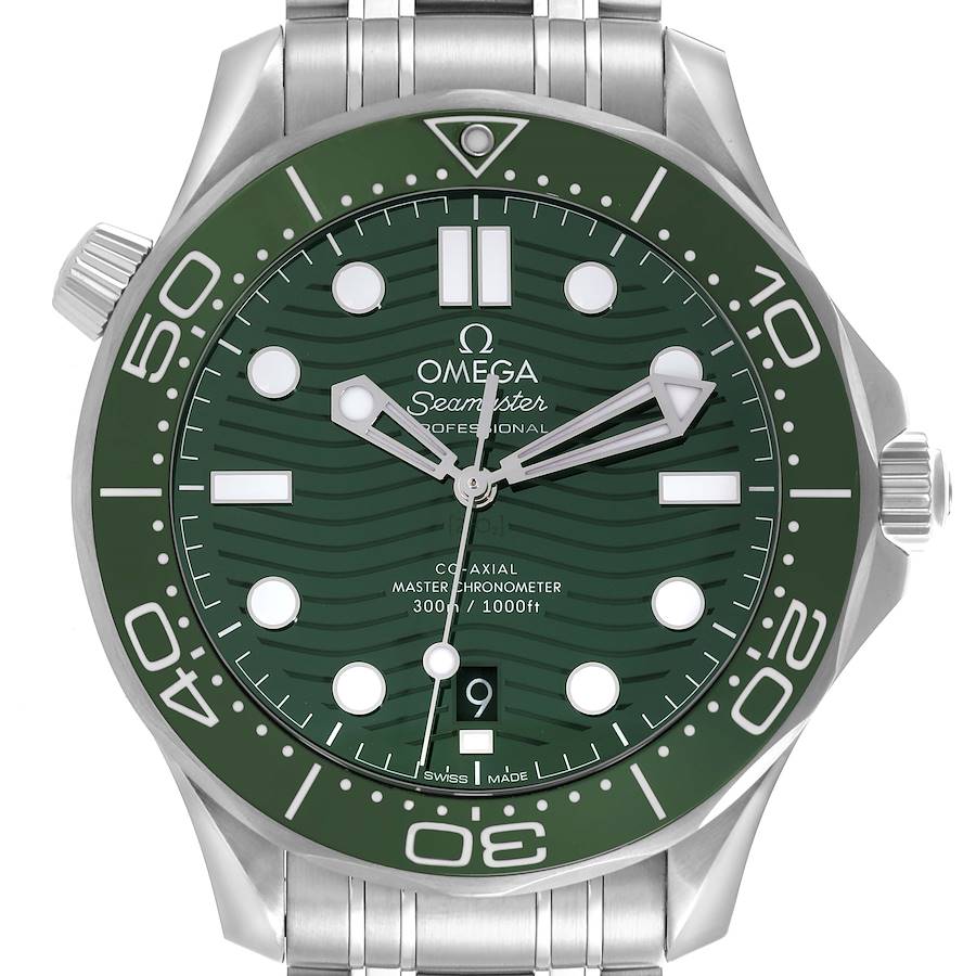 The Omega Seamaster watch is shown from the front, highlighting its green bezel, dial, and bracelet.