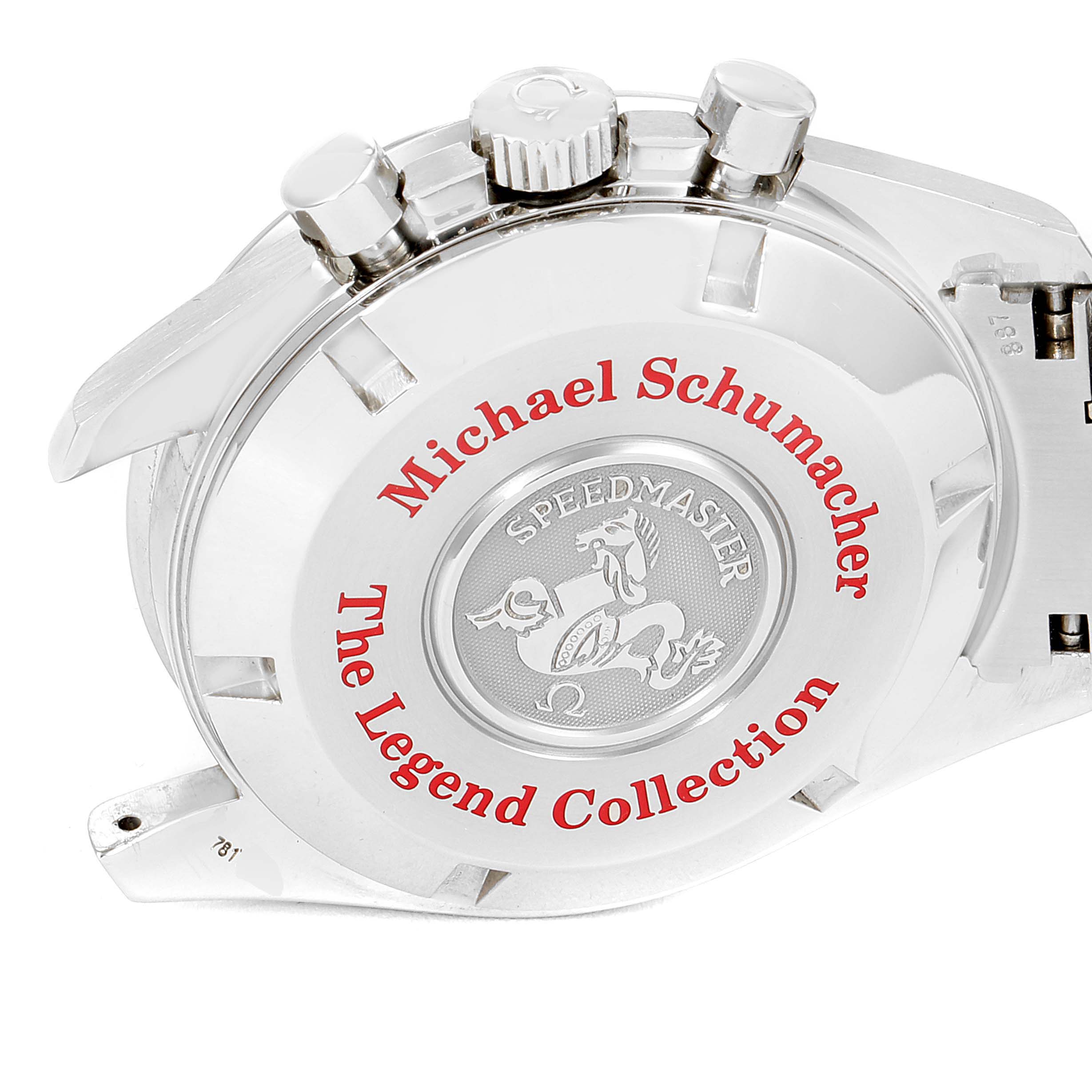 The image shows the backside of an Omega Speedmaster 3506.31.00 Men's Stainless Steel Silver Dial 3506.31.00 Men's Stainless Steel Silver Dial "The Legend Collection" watch, highlighting the engraved details and control buttons.