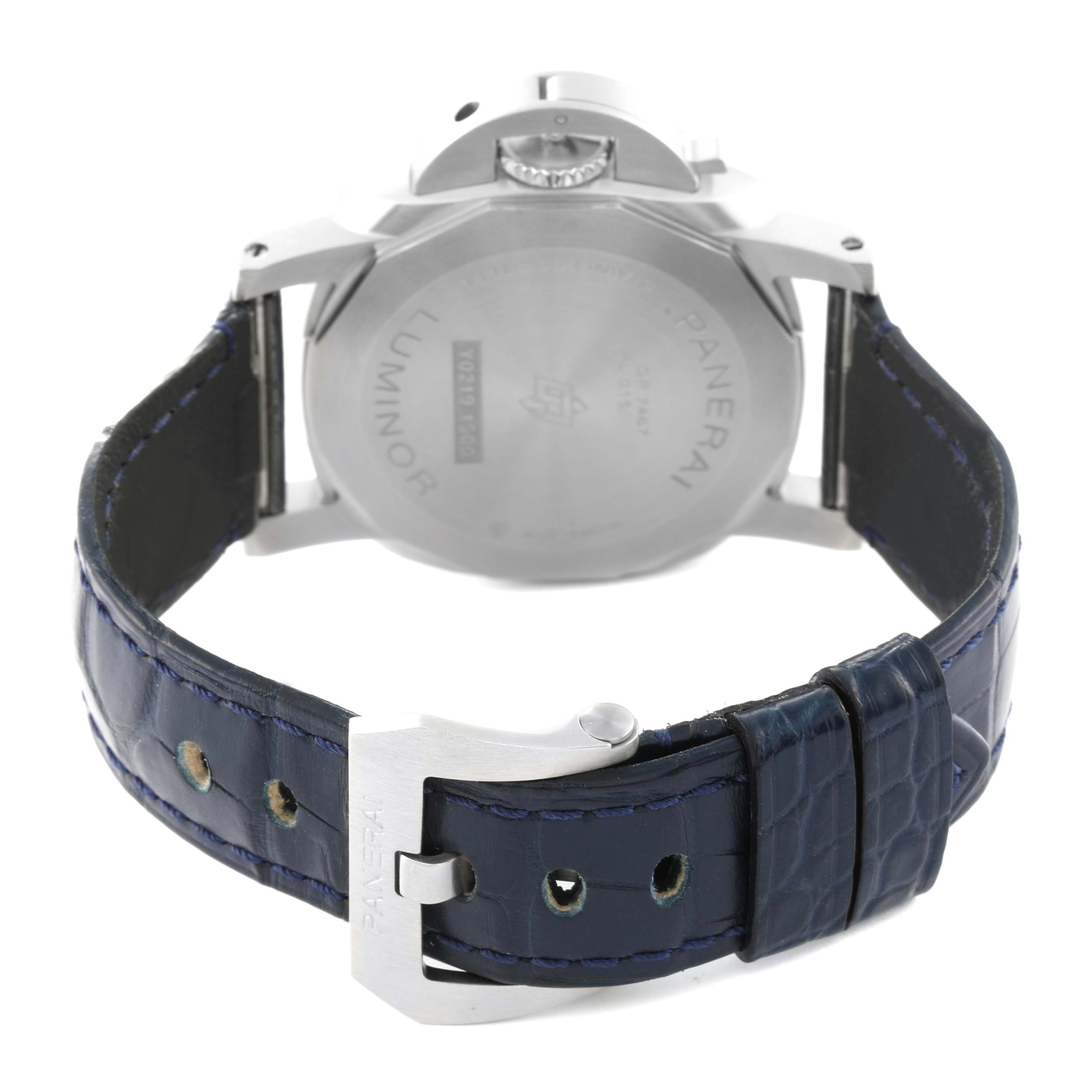 The image shows the back of a Panerai Luminor PAM01370 Men's Stainless Steel Blue Dial PAM01370 Men's Stainless Steel Blue Dial watch with a focus on the case back and the blue leather strap with the buckle.