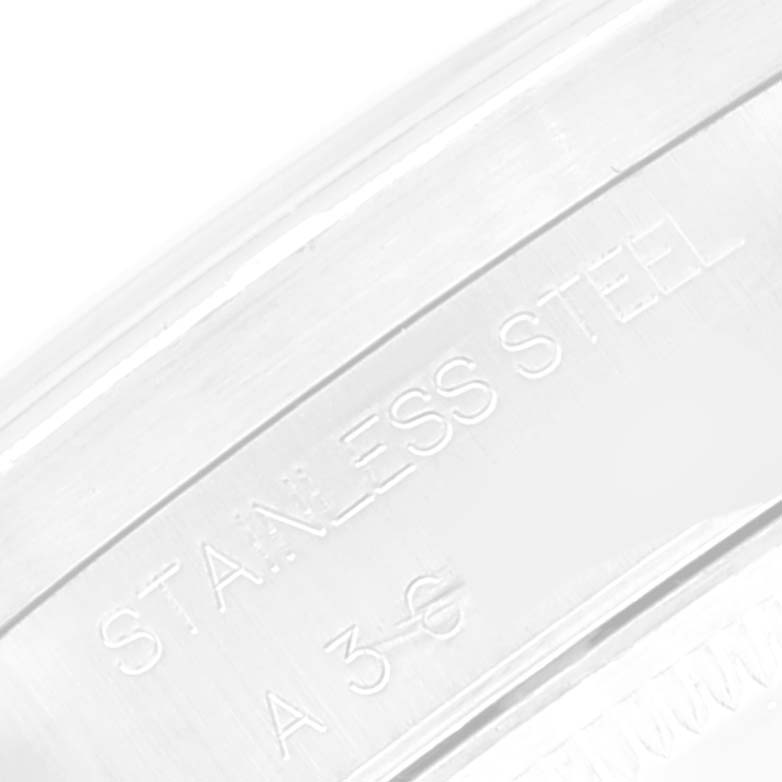 A close-up of the stainless steel labeling on the case back of a Rolex Air-King 14010 Men's Stainless Steel Silver Dial 14010 Men's Stainless Steel Silver Dial watch.