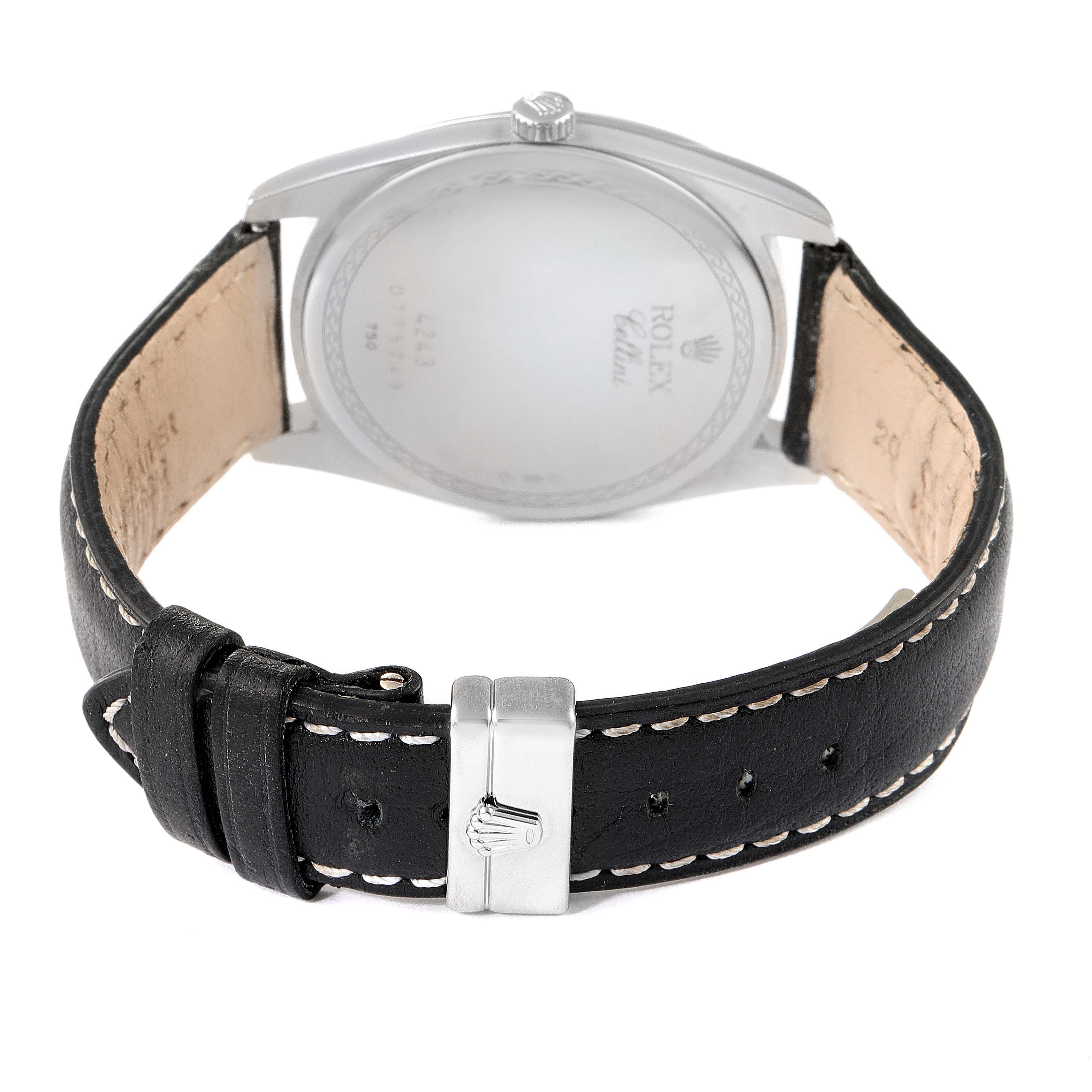 The image shows the back view of a Rolex Cellini 4243 Men's White Gold Black Dial 4243 Men's White Gold Black Dial watch, highlighting its leather strap with white stitching and buckle.