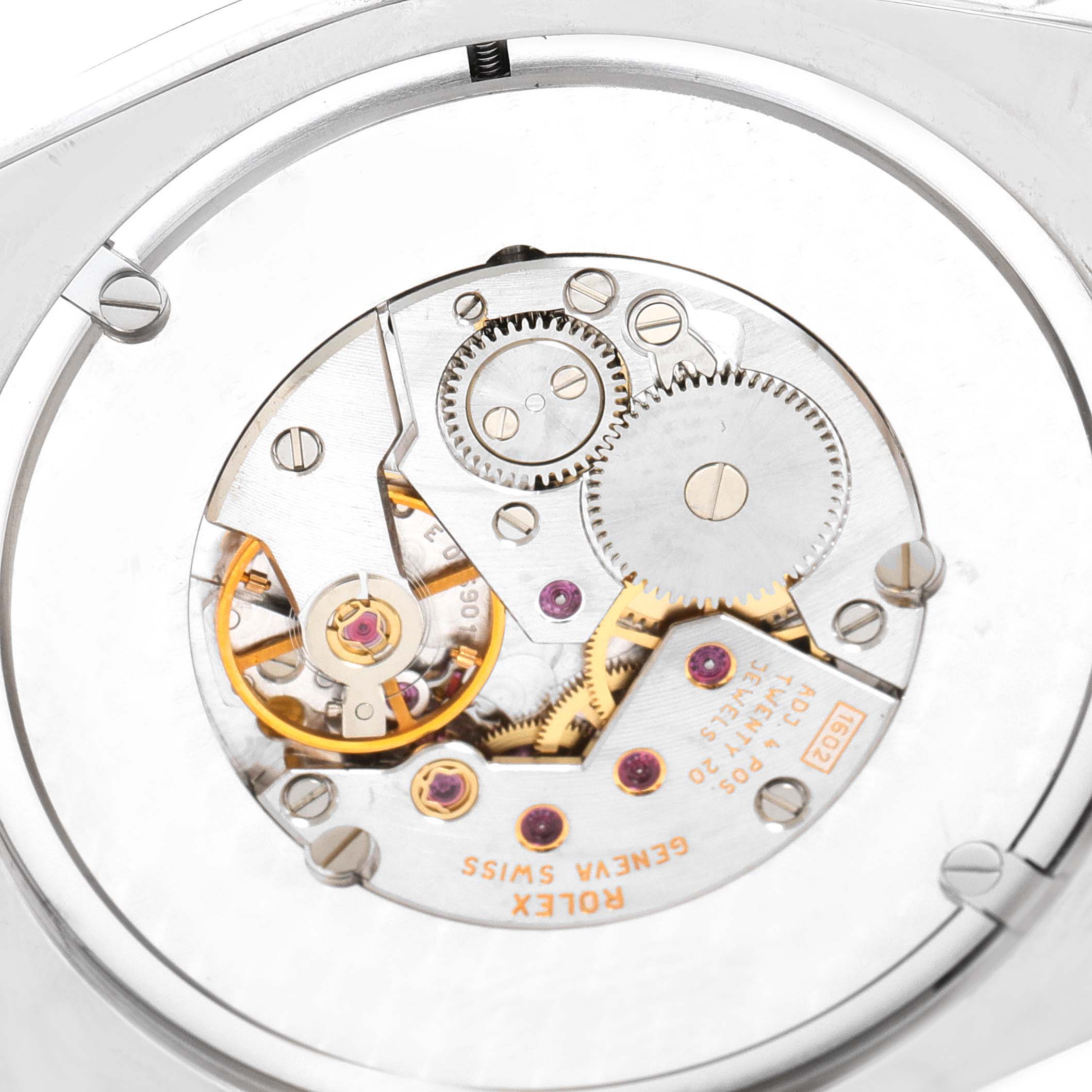 This image shows the intricate movement mechanism of the Rolex Cellini 4243 Men's White Gold Black Dial 4243 Men's White Gold Black Dial watch from a close-up angle.