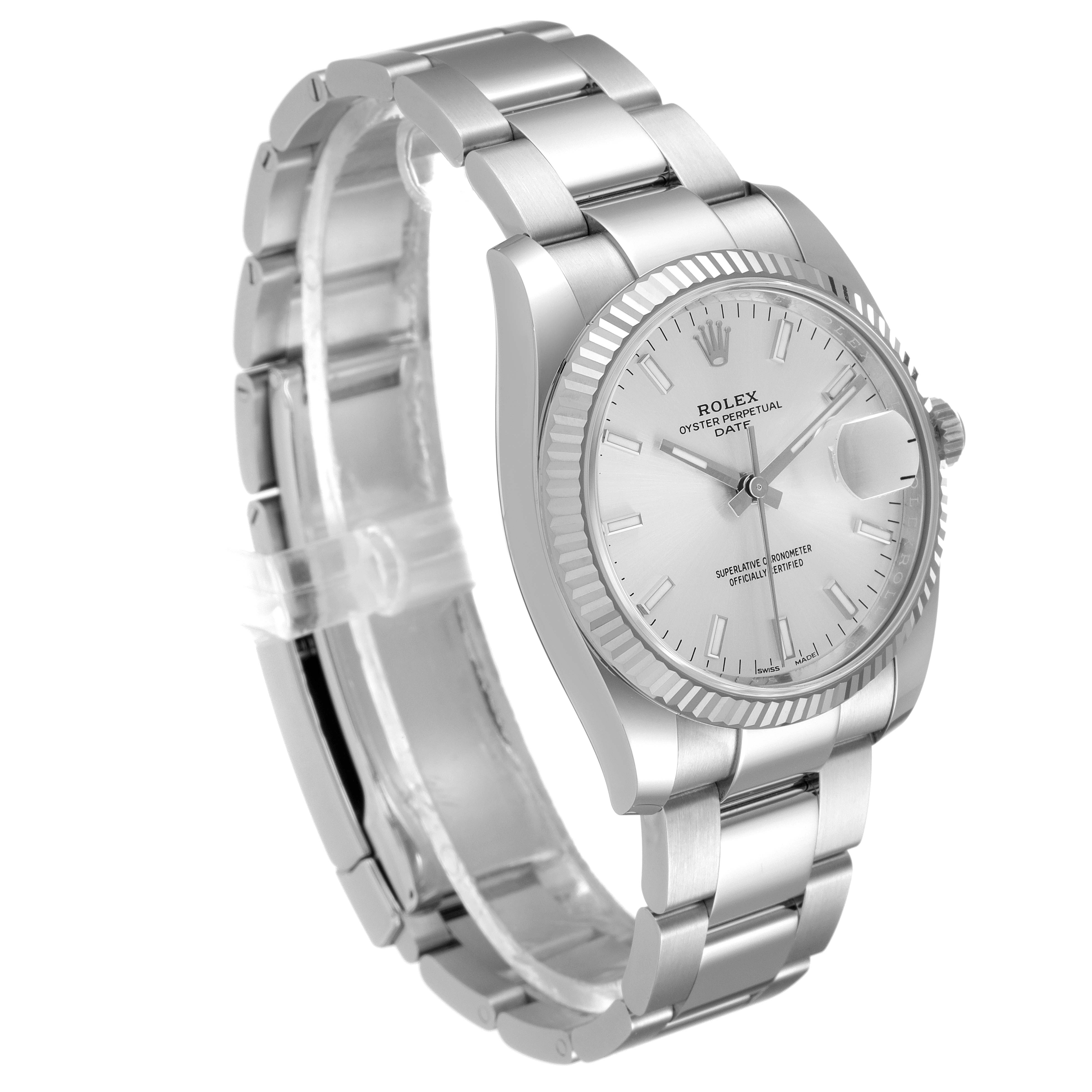 The image shows a Rolex Date 115234 Men's Stainless Steel Silver Dial 115234 Men's Stainless Steel Silver Dial model watch at a three-quarter angle, highlighting the bracelet, dial, and fluted bezel.