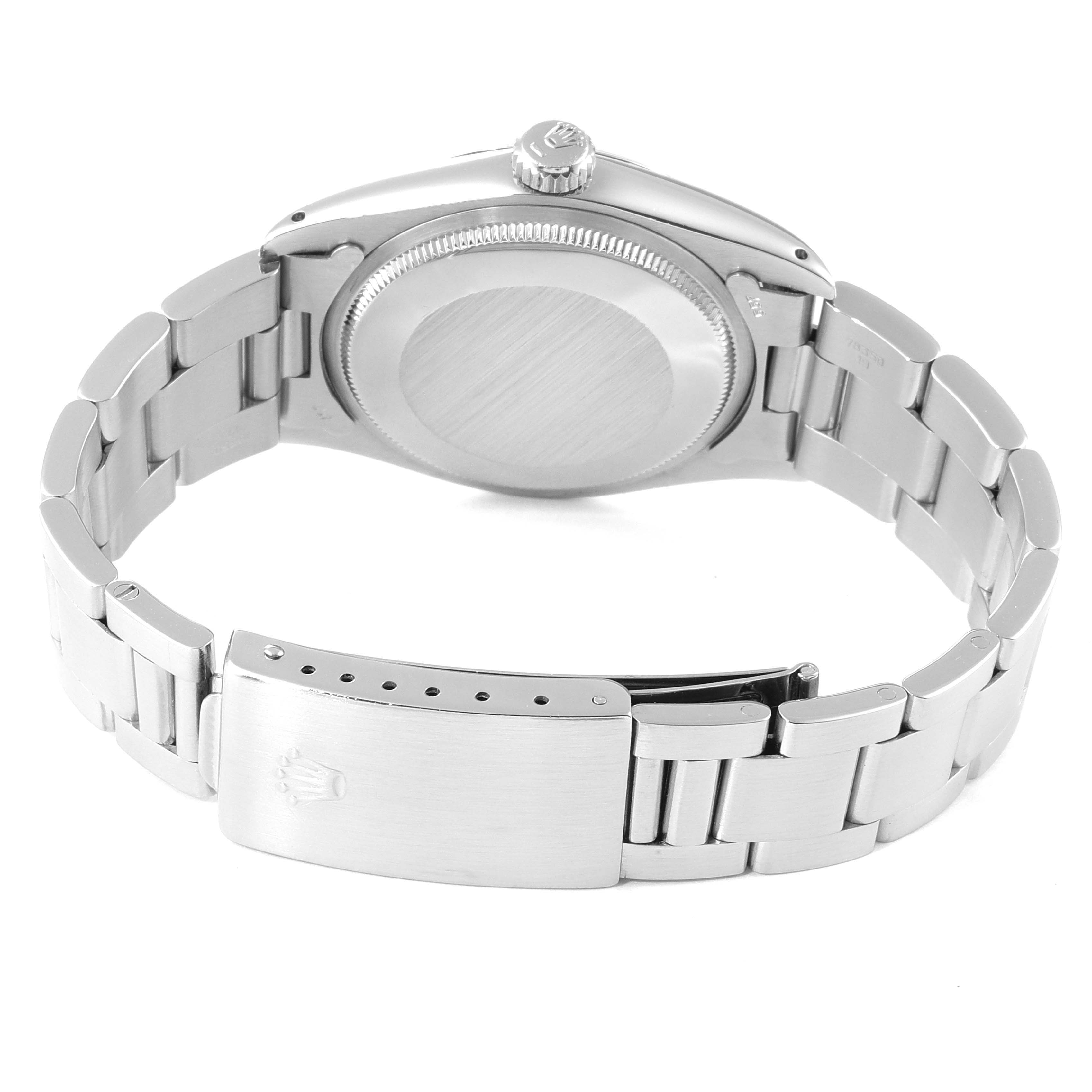 The image shows the back view of a Rolex Vintage Collection 1500 Men's Stainless Steel Silver Dial 1500 Men's Stainless Steel Silver Dial watch, highlighting its clasp, bracelet, and case back.