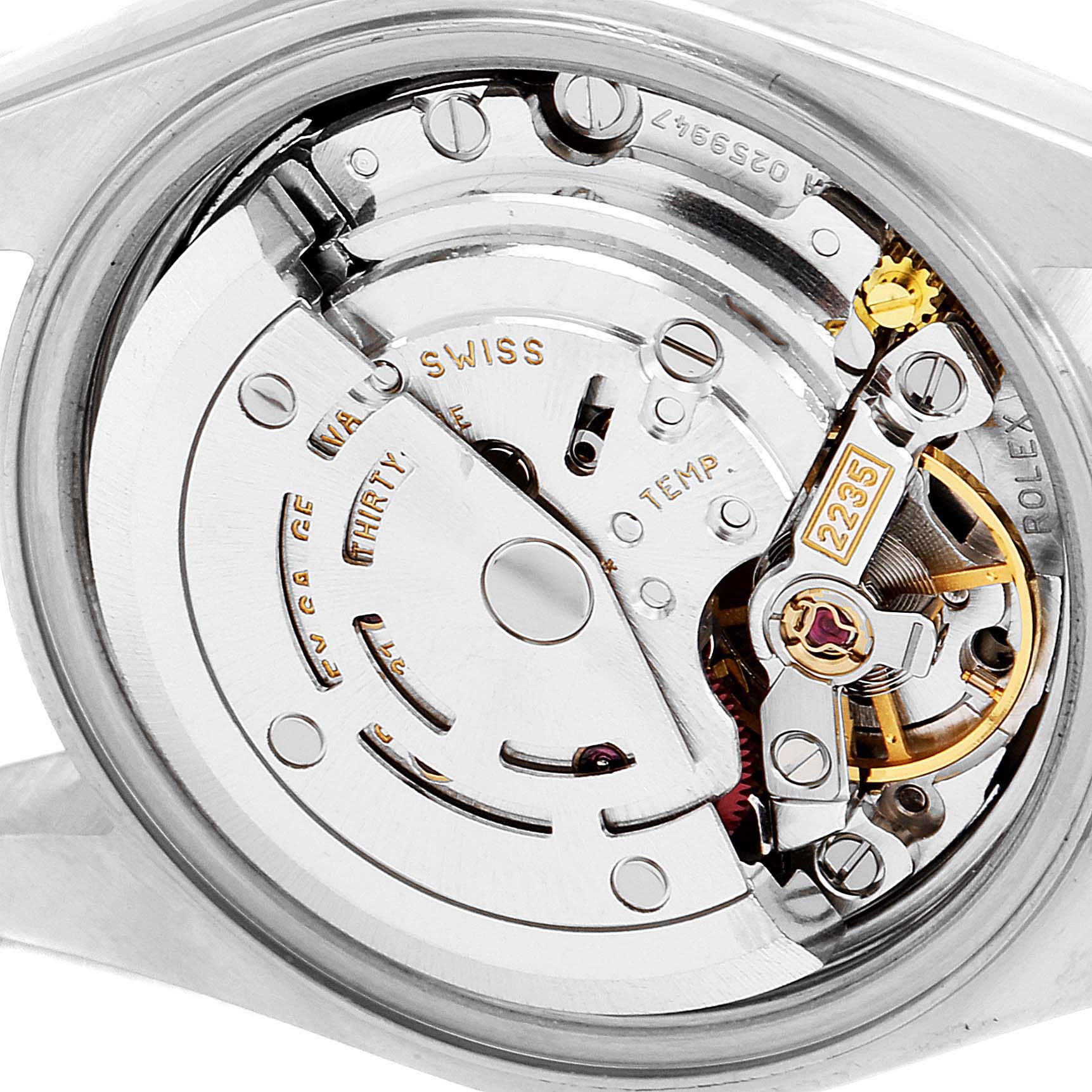 This image shows an internal view of the Rolex Datejust 79173 Women
s Steel and Gold (two tone) Grey Dial 79173 Women
s Steel and Gold (two tone) Grey Dial watch, highlighting its movement and mechanical components.