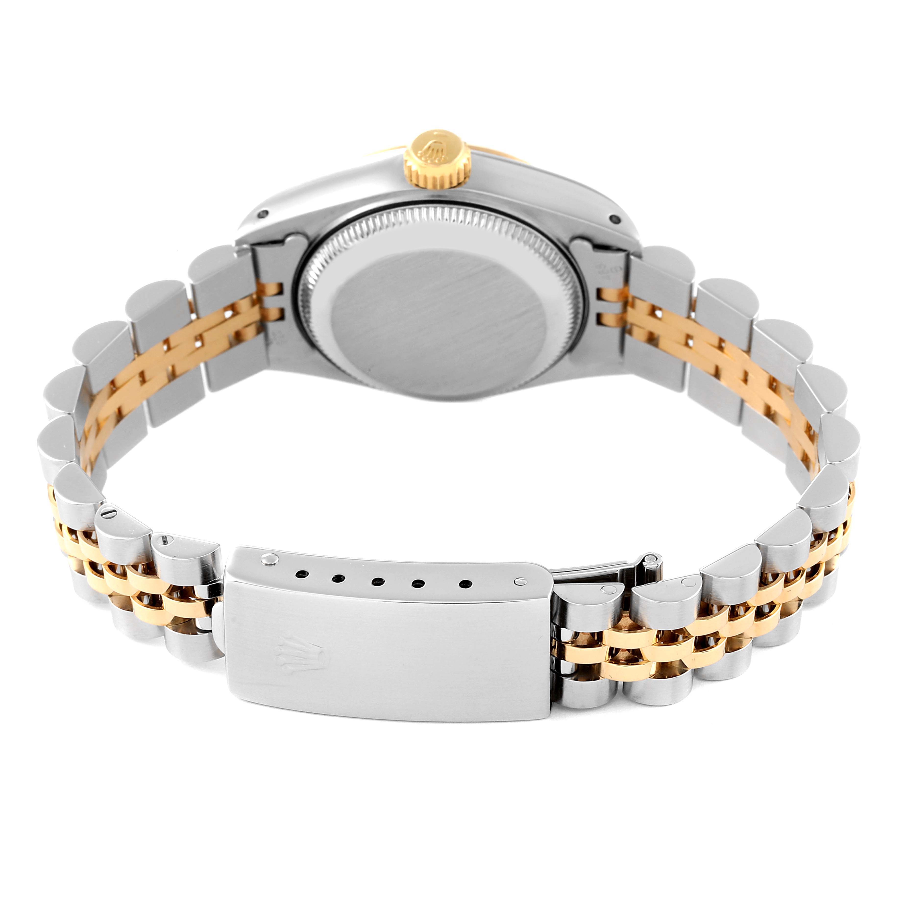 The image shows the back and clasp of a Rolex Datejust 69173 Women's Steel and Gold (two tone) Champagne Dial 69173 Women's Steel and Gold (two tone) Champagne Dial watch, highlighting its two-tone bracelet and case.