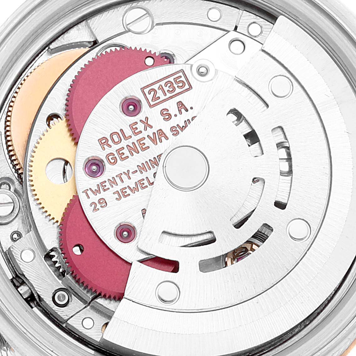 This image shows the internal movement mechanism of a Rolex Datejust 69173 Women's Steel and Gold (two tone) Champagne Dial 69173 Women's Steel and Gold (two tone) Champagne Dial watch, highlighting gears and the rotor.
