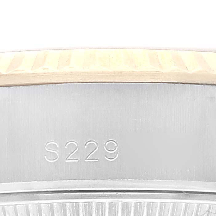 This image shows a close-up of the bezel and case of a Rolex Datejust 69173 Women's Steel and Gold (two tone) Champagne Dial 69173 Women's Steel and Gold (two tone) Champagne Dial watch, with the engraving "S229" visible.