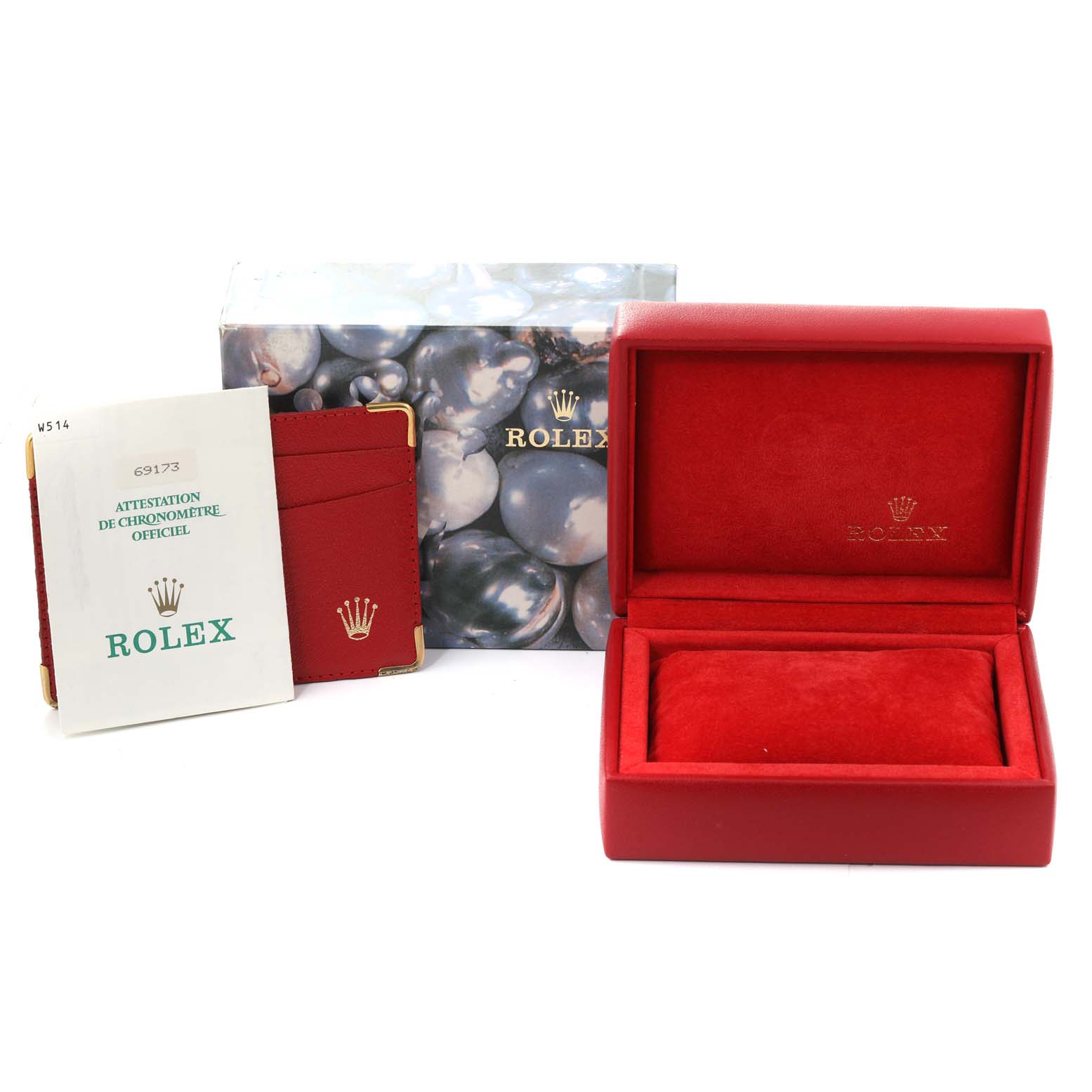 This image shows the packaging, certification booklet, and red Rolex box for the Datejust model.