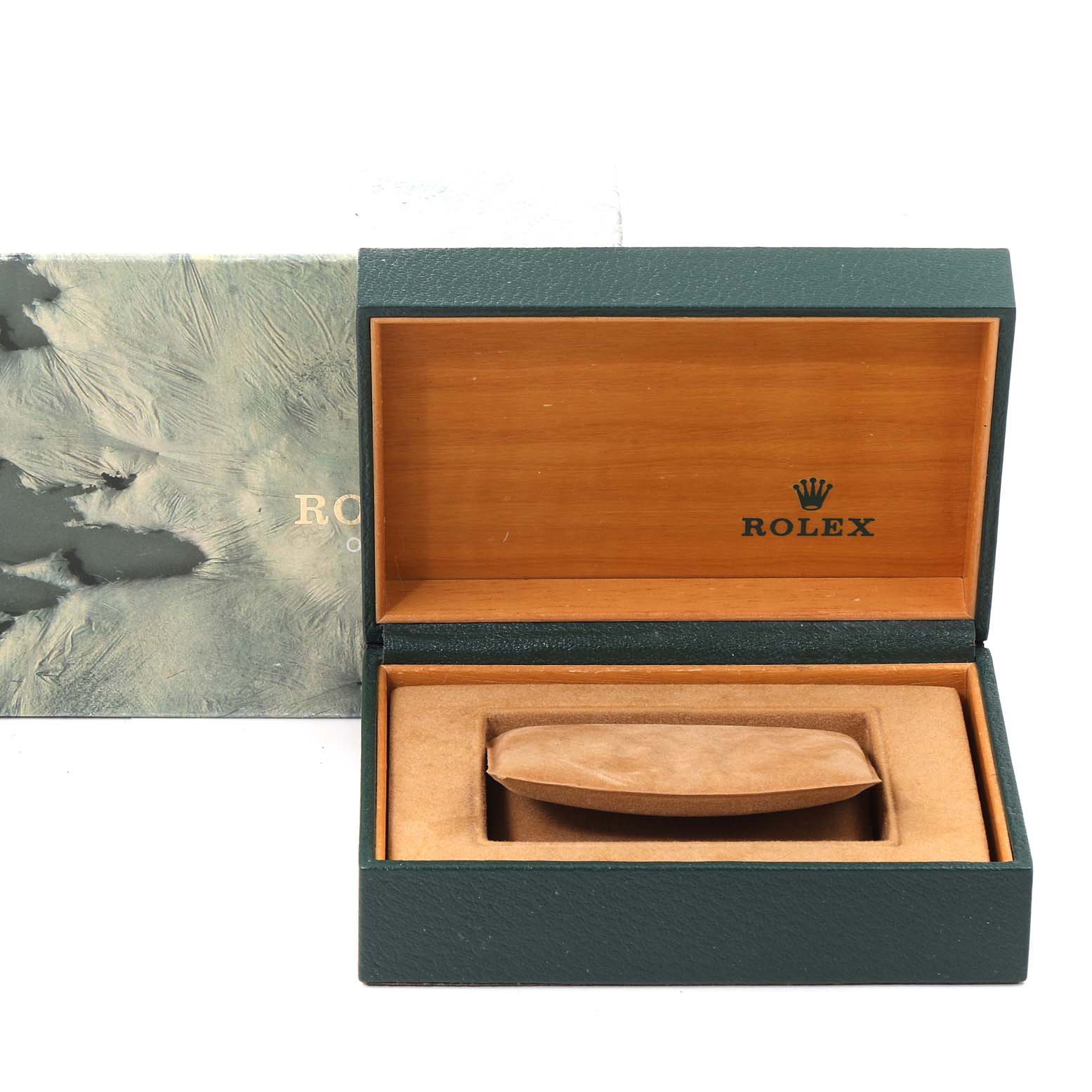 The image shows an open Rolex Vintage Collection 16013 Men
s Steel and Gold (two tone) Champagne Dial 16013 Men
s Steel and Gold (two tone) Champagne Dial watch box, revealing its interior wooden lining and watch cushion.