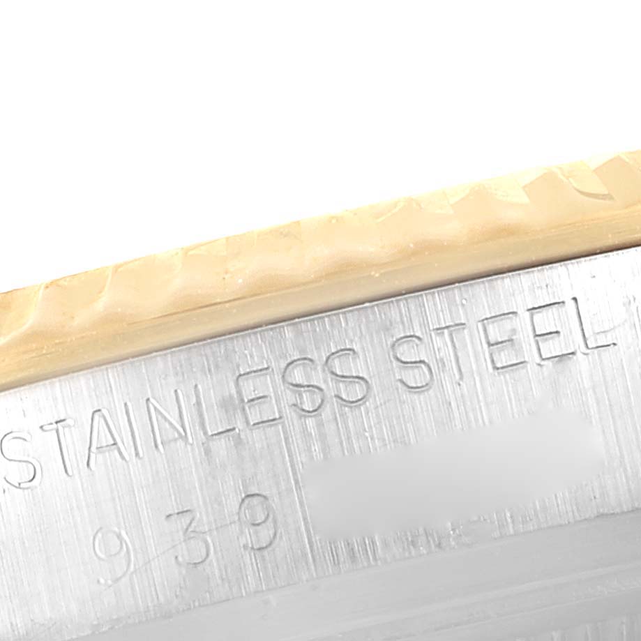 The image shows a close-up of the edge and engravings on the stainless steel case of the Rolex Vintage Collection 16013 Men
s Steel and Gold (two tone) Champagne Dial 16013 Men
s Steel and Gold (two tone) Champagne Dial watch.