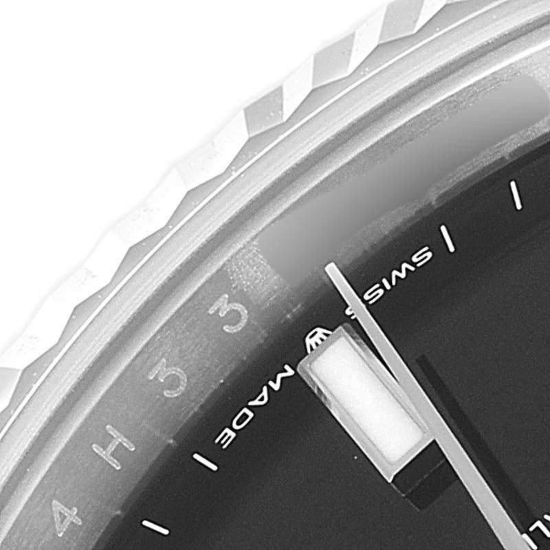 This image shows a close-up of the dial and fluted bezel from an angle of the Rolex Datejust 41 126334 Men
s Stainless Steel Black Dial 126334 Men
s Stainless Steel Black Dial watch.