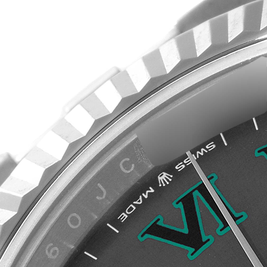 The image shows a close-up of the bezel and part of the dial of a Rolex Datejust 41 126334 Men's Stainless Steel Grey Dial 126334 Men's Stainless Steel Grey Dial watch.