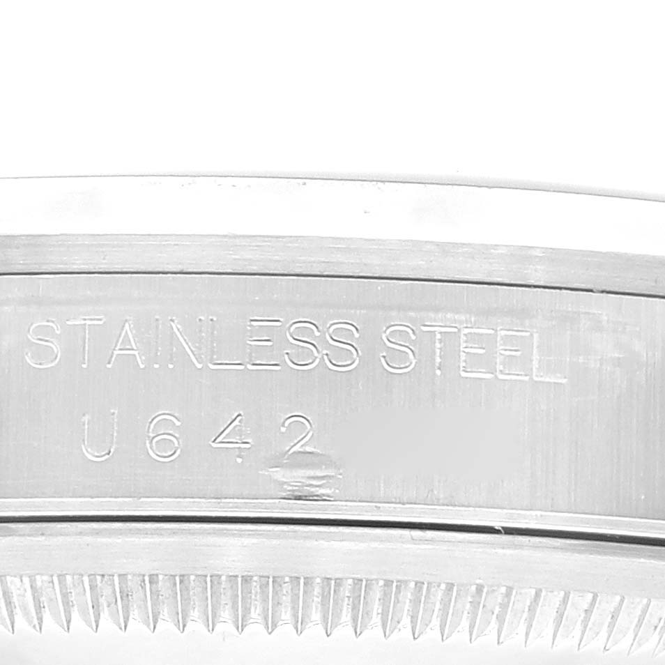 This image shows a close-up view of the stainless steel case back engraving of a Rolex Datejust 16200 Men's Stainless Steel Blue Dial 16200 Men's Stainless Steel Blue Dial watch.