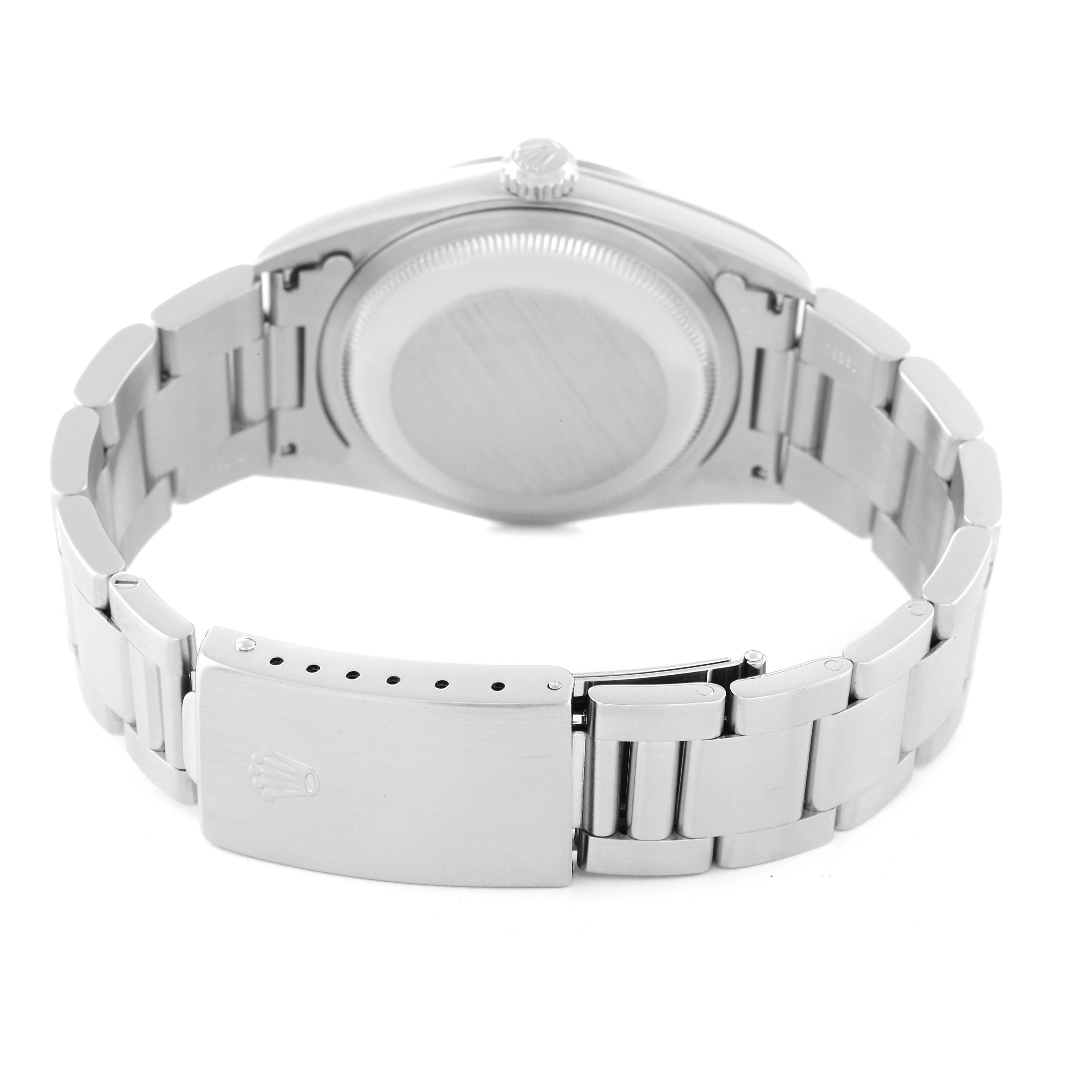 This image shows the Rolex Datejust 16200 Men's Stainless Steel Blue Dial 16200 Men's Stainless Steel Blue Dial watch from the back, focusing on the case back, crown, and metal bracelet clasp.