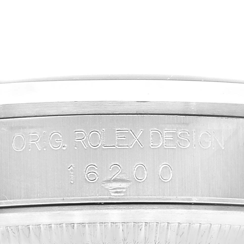 This image shows a close-up of the model number engraving on the case of a Rolex Datejust 16200 Men's Stainless Steel Blue Dial 16200 Men's Stainless Steel Blue Dial watch.