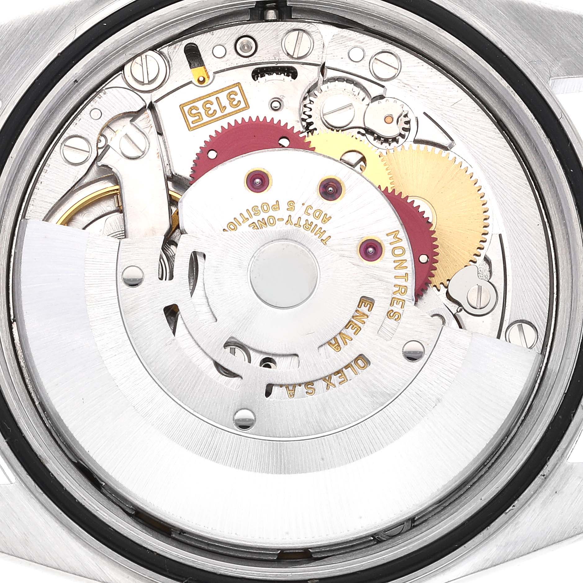 The image shows the inner mechanics of a Rolex Datejust 16200 Men's Stainless Steel Blue Dial 16200 Men's Stainless Steel Blue Dial watch, focusing on the movement from a backside angle.