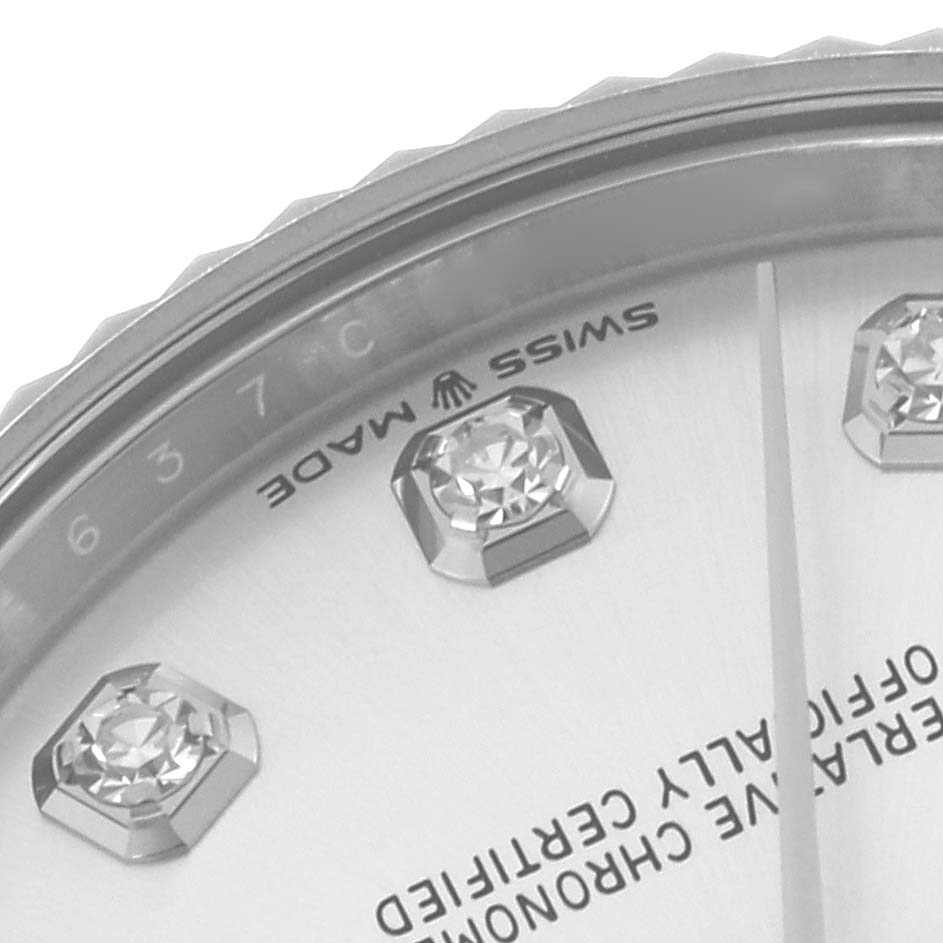 The image shows a close-up of a Rolex Mid-Size 278274 Women's Stainless Steel Silver Dial 278274 Women's Stainless Steel Silver Dial watch dial featuring diamond markers and the bezel with "Swiss Made" text.