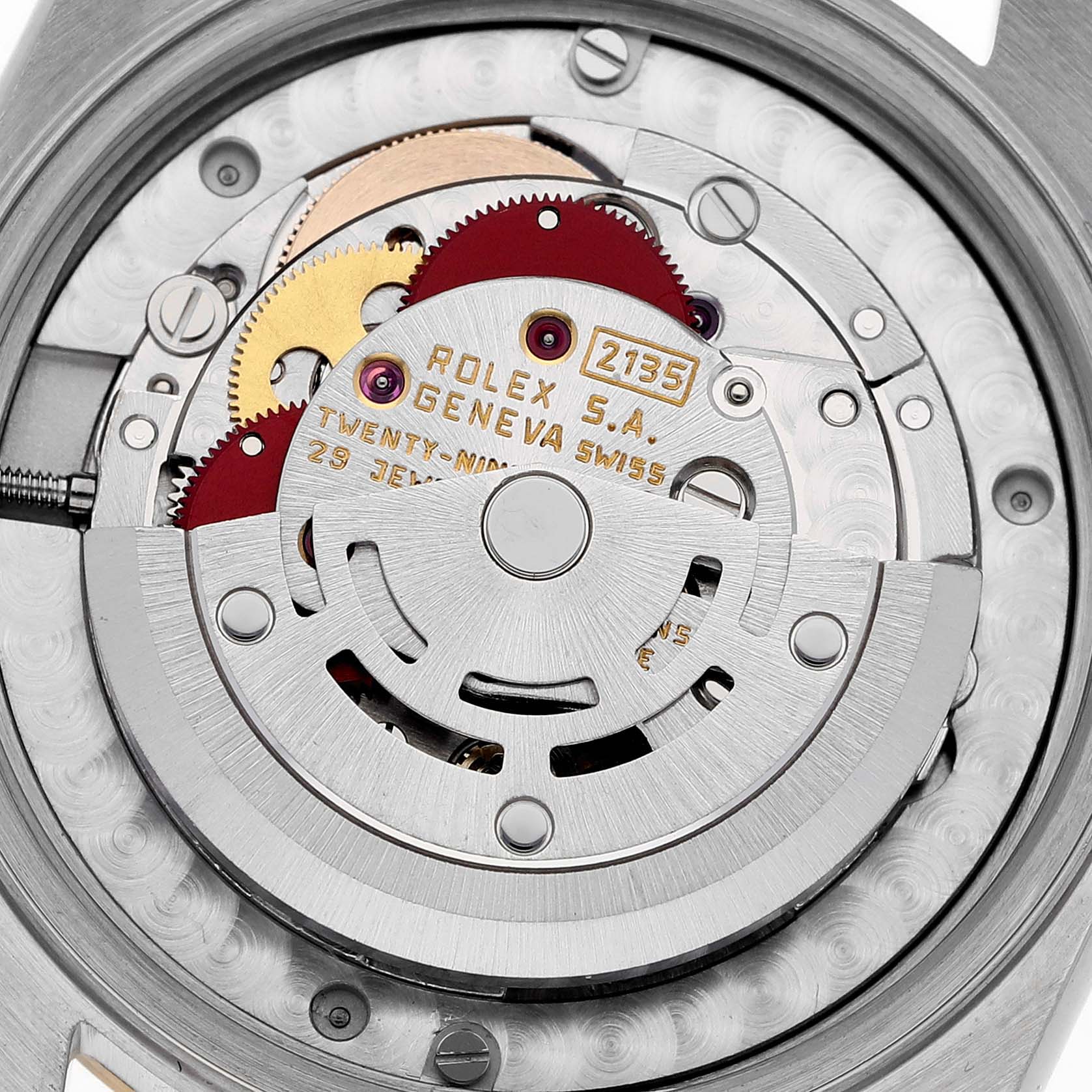 The image shows a close-up view of the inner mechanical components of a Rolex Mid-Size 68273 Women
s Steel and Gold (two tone) White Dial 68273 Women
s Steel and Gold (two tone) White Dial watch, highlighting its movement mechanism.