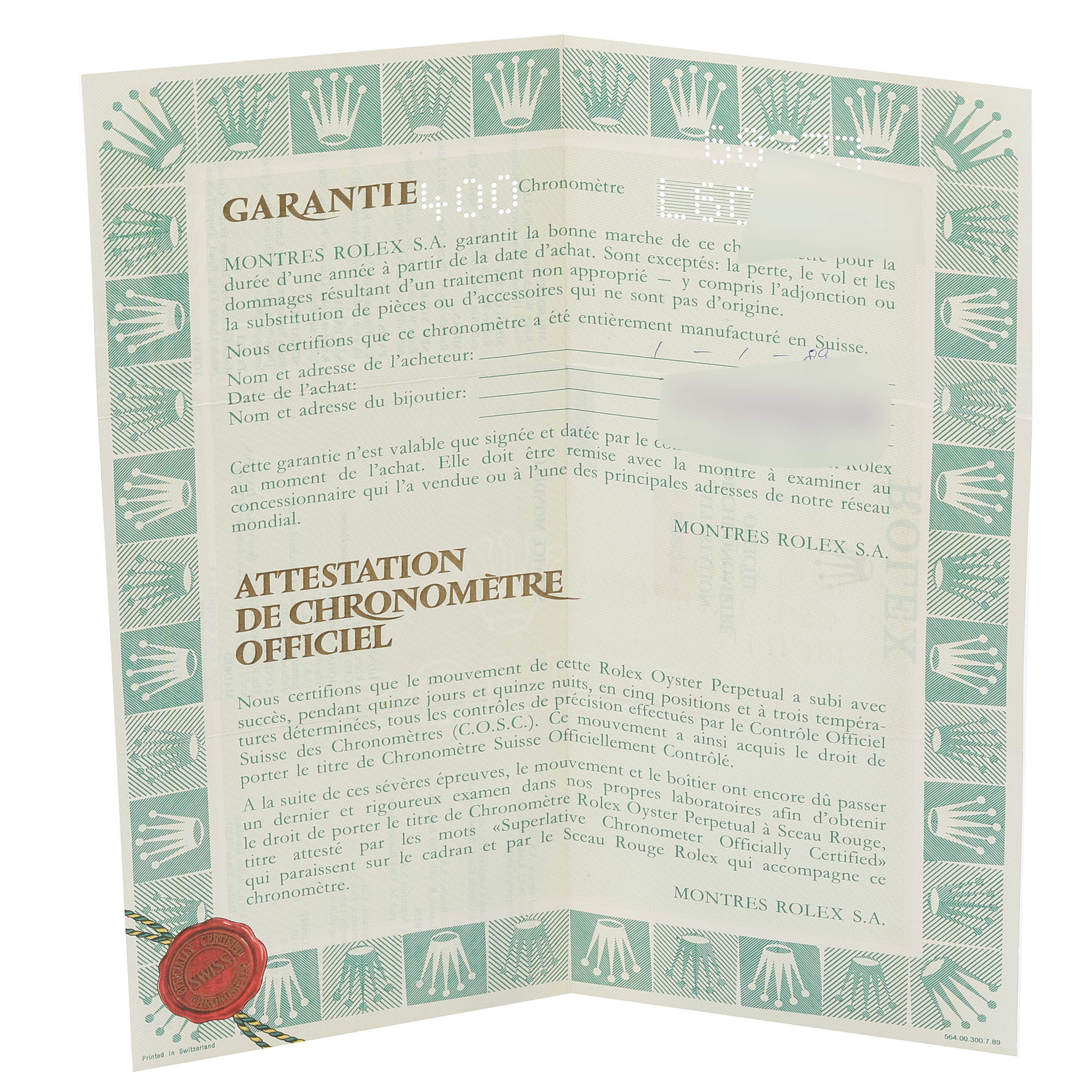 This is an image of the guarantee and chronometer official certification papers for a mid-size Rolex watch.