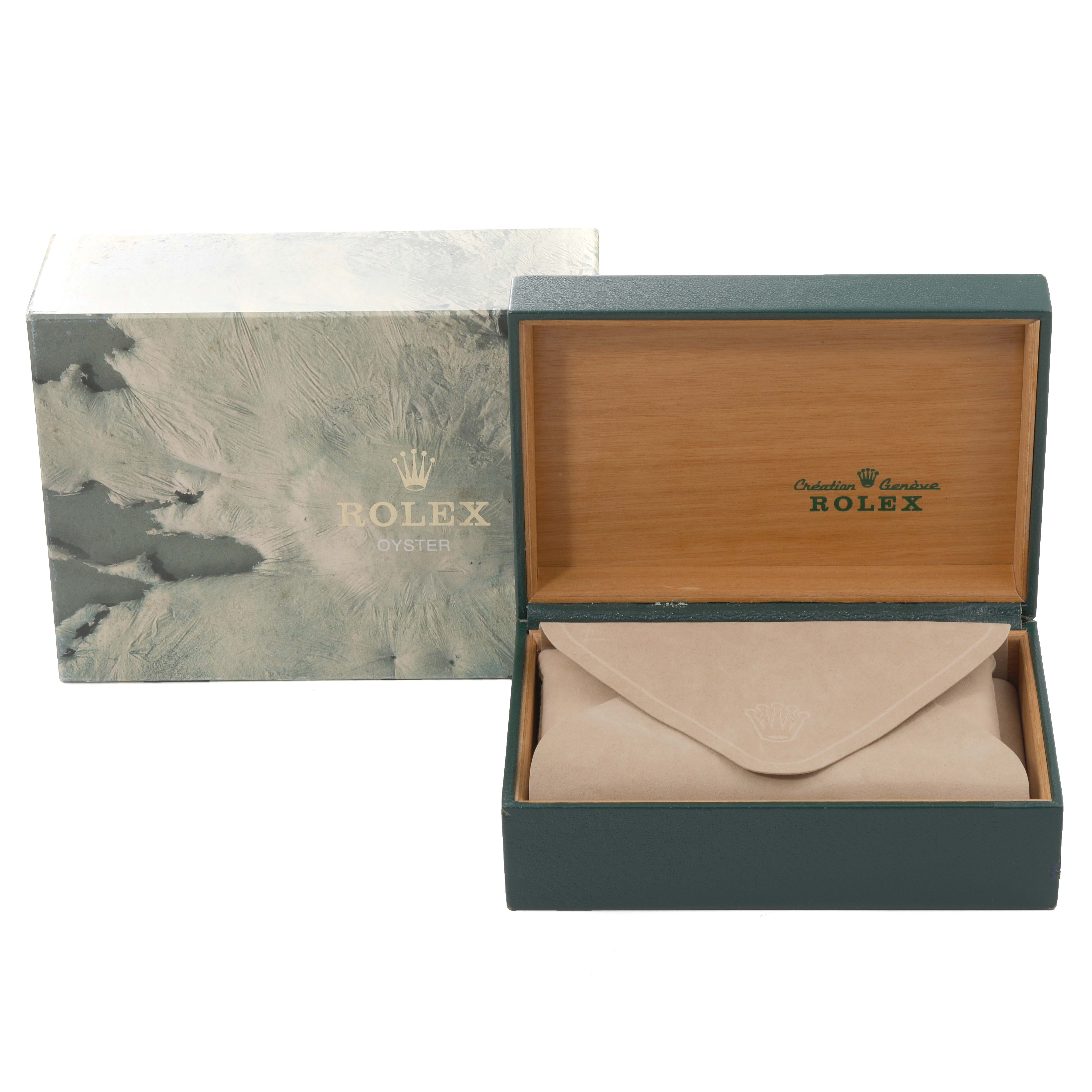 The image shows the Rolex Mid-Size 68273 Women's Steel and Gold (two tone) Champagne Dial 68273 Women's Steel and Gold (two tone) Champagne Dial watch's packaging with both the outer box and the opened inner wooden box containing a pouch.