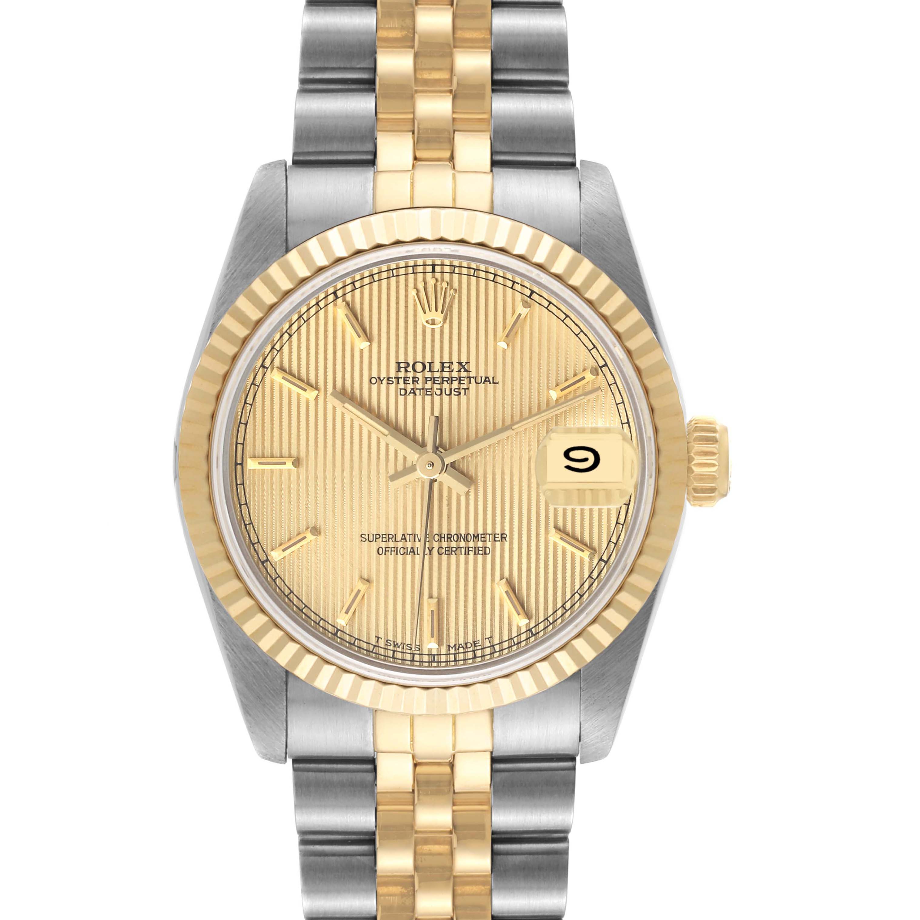 The image shows a front view of the Rolex Mid-Size 68273 Women's Steel and Gold (two tone) Champagne Dial 68273 Women's Steel and Gold (two tone) Champagne Dial Datejust watch featuring a gold and silver bracelet and a gold dial.