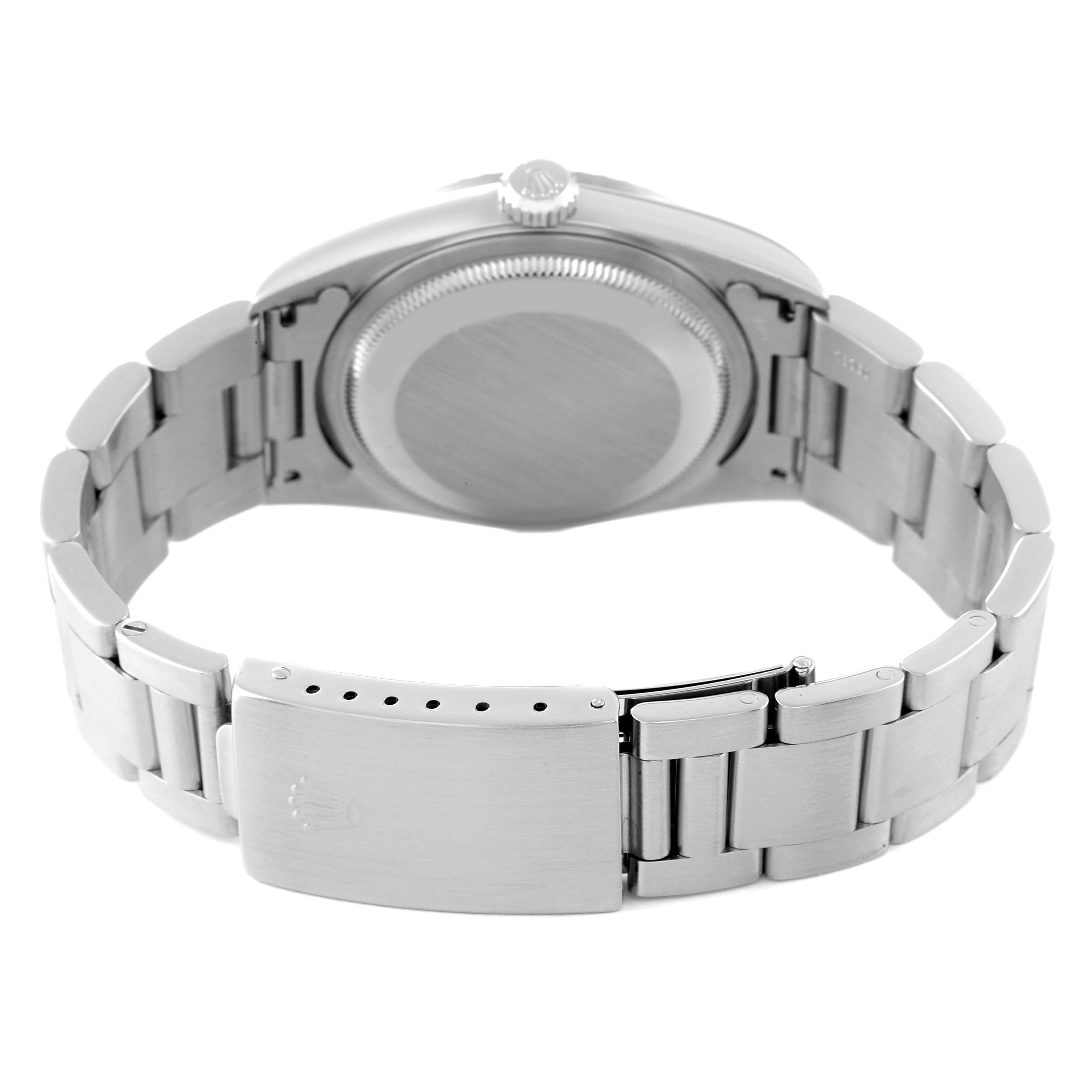 This image shows the back and bracelet clasp of a Rolex Datejust 16220 Men's Stainless Steel Silver Dial 16220 Men's Stainless Steel Silver Dial watch.