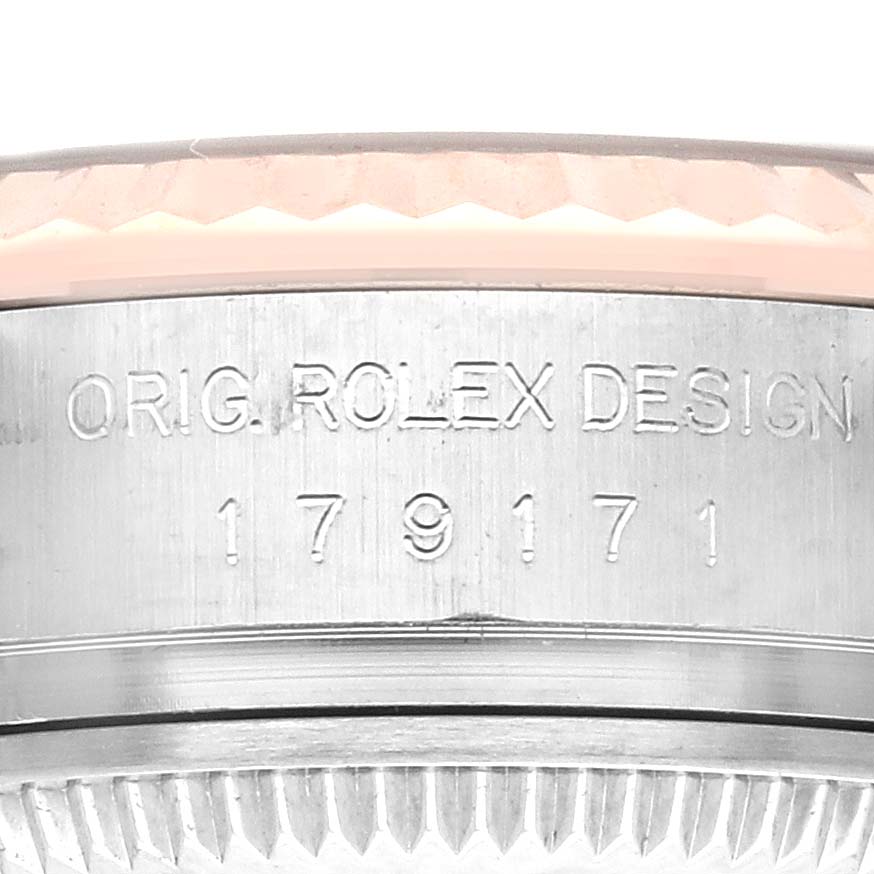 The image shows a close-up side view of the Datejust Rolex's case, highlighting the engraved model number.