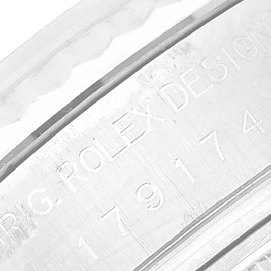 The image shows a close-up of the inner bezel engraved with "ROLEX" on a Rolex Datejust 179174 Women's Stainless Steel Mother of Pearl Dial 179174 Women's Stainless Steel Mother of Pearl Dial watch.