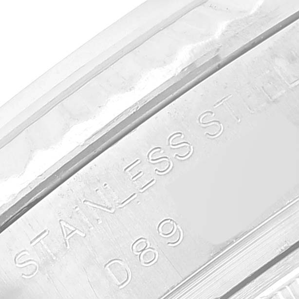 The image shows a close-up of the stainless steel engraving on the side of a Rolex Datejust 179174 Women's Stainless Steel Mother of Pearl Dial 179174 Women's Stainless Steel Mother of Pearl Dial watch.