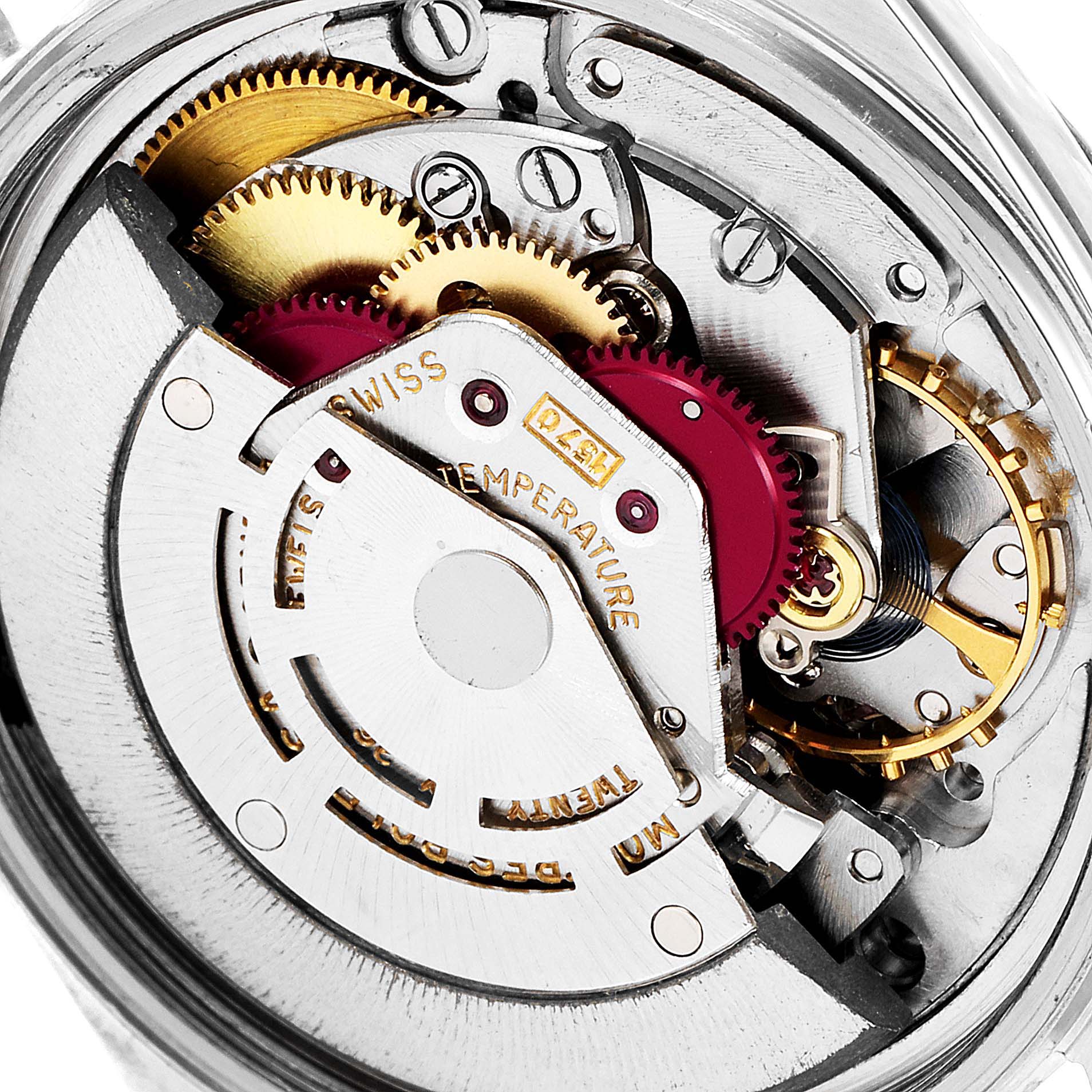 This close-up image shows the intricate movement and gears of the Rolex Vintage Collection 1601 Men's Steel and Gold (two tone) Blue Dial 1601 Men's Steel and Gold (two tone) Blue Dial watch.