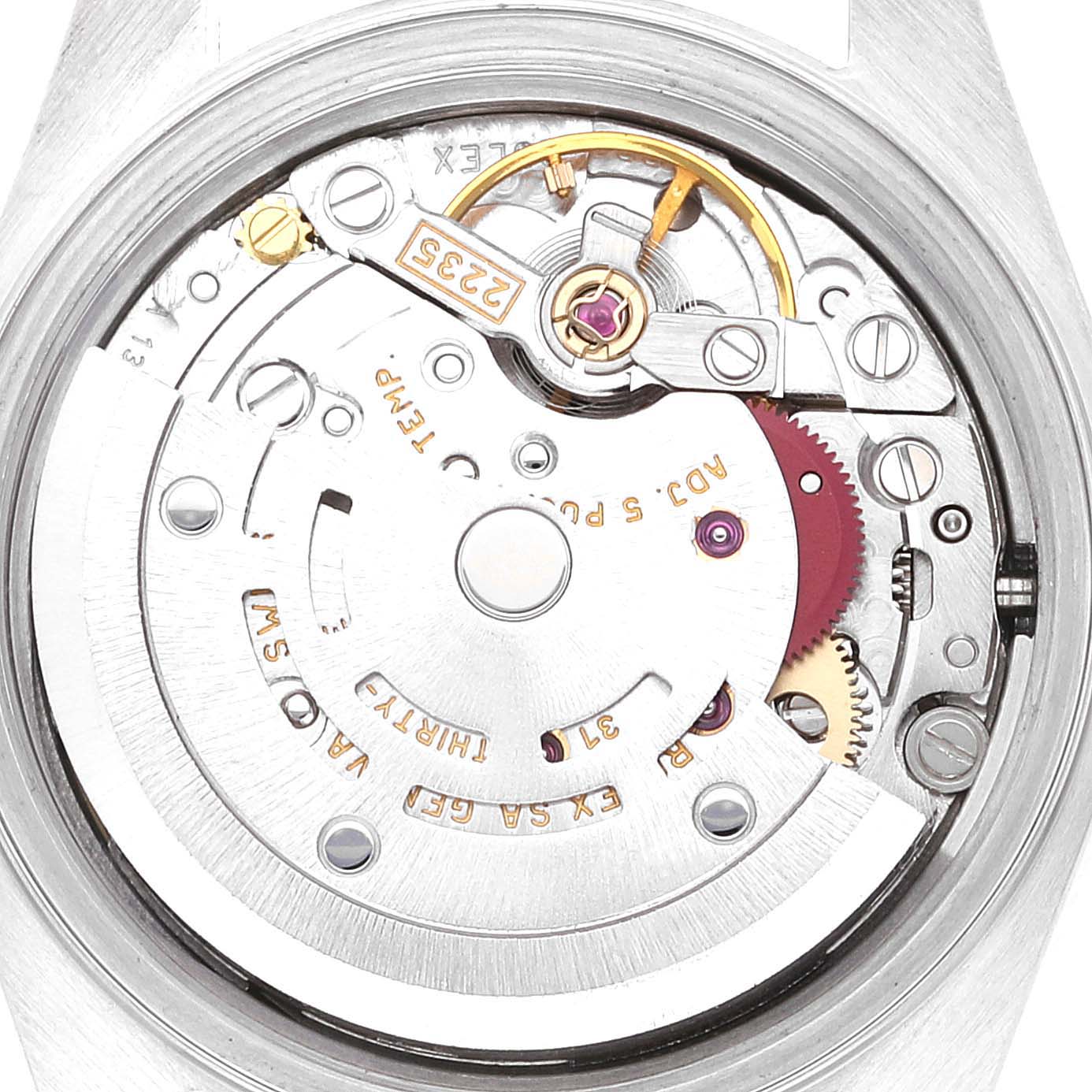 The image shows the internal mechanism of a Rolex Datejust 79173 Women's Steel and Gold (two tone) Champagne Dial 79173 Women's Steel and Gold (two tone) Champagne Dial watch from a top-down angle, highlighting gears and movements.